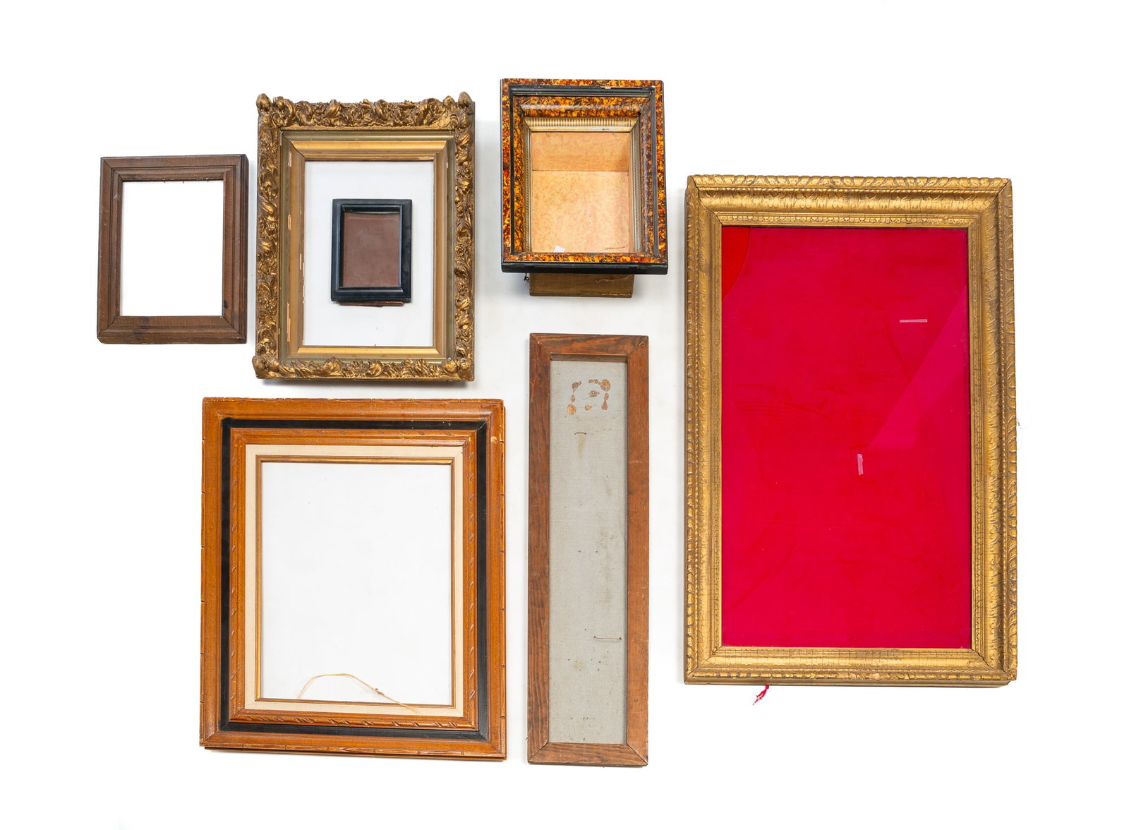 GROUP OF PICTURE FRAMES.: GROUP OF PICTURE FRAMES. 20th Century. Includes giltwood frames, a shadowbox frame, and a wooden frame. Largest, 25.5"h. 40"w. Provenance: From the Lifetime Collection of the late Ken Hanna (Chester,