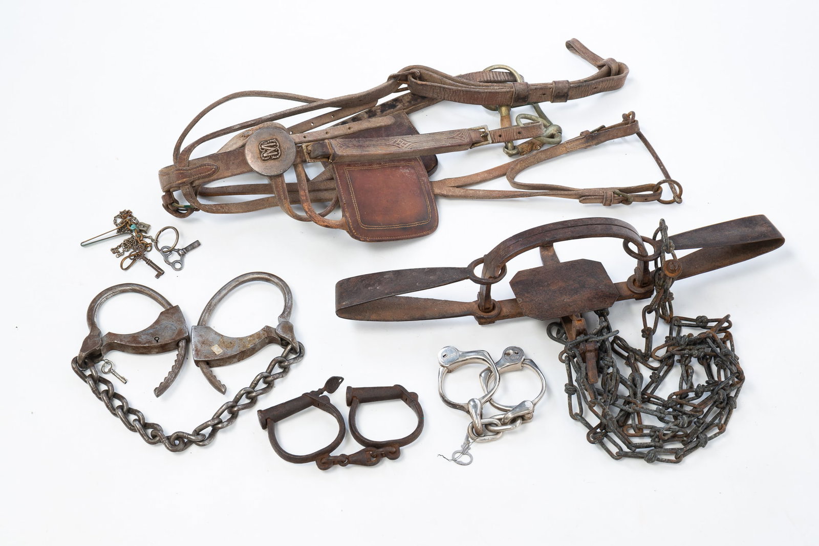 COLLECTION OF METAL RESTRAINTS. (1 of 6)