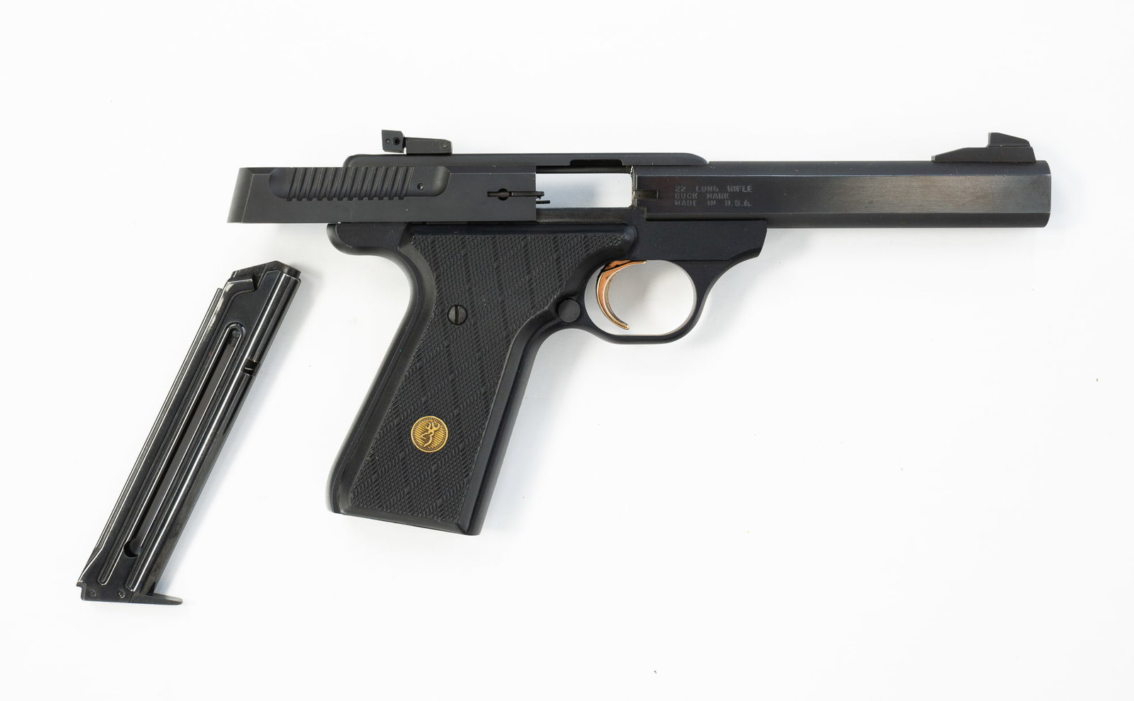 BROWNING BUCKMARK SEMI-AUTOMATIC PISTOL.: BROWNING BUCKMARK SEMI-AUTOMATIC PISTOL. American, 20th Century. Serial 655PN20138. Aluminum frame composite grips with skipline checkering and includes a ten-shot magazine. *FFL requirements apply.