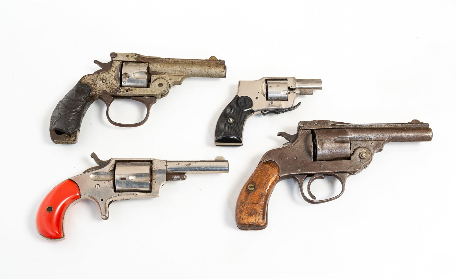 FOUR AMERICAN REVOLVERS IN VARIOUS CONDITIONS. (1 of 7)