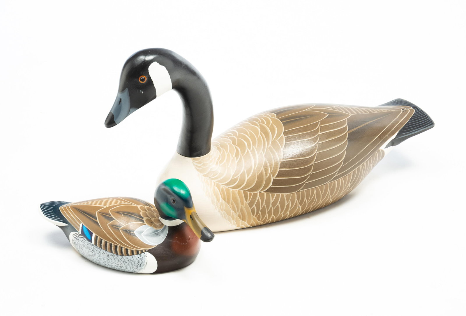 TWO REBECCA BARKER (AMERICAN, ACTIVE LATE 20TH CENTURY) PAINTED AND CARVED DECOYS, INCL. CANADA (1 of 7)