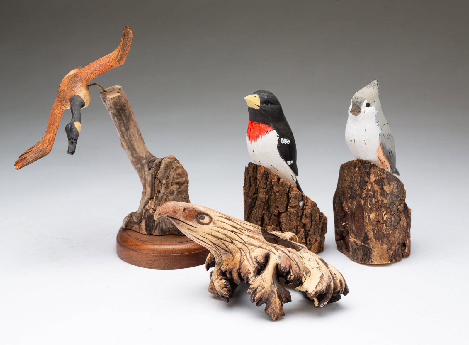 FOUR AMERICAN FOLKSY CARVED AND PAINT-DECORATED BIRDS, INCL. STEPHEN FRANKLIN (ALBERTON, MONTANA). (1 of 6)
