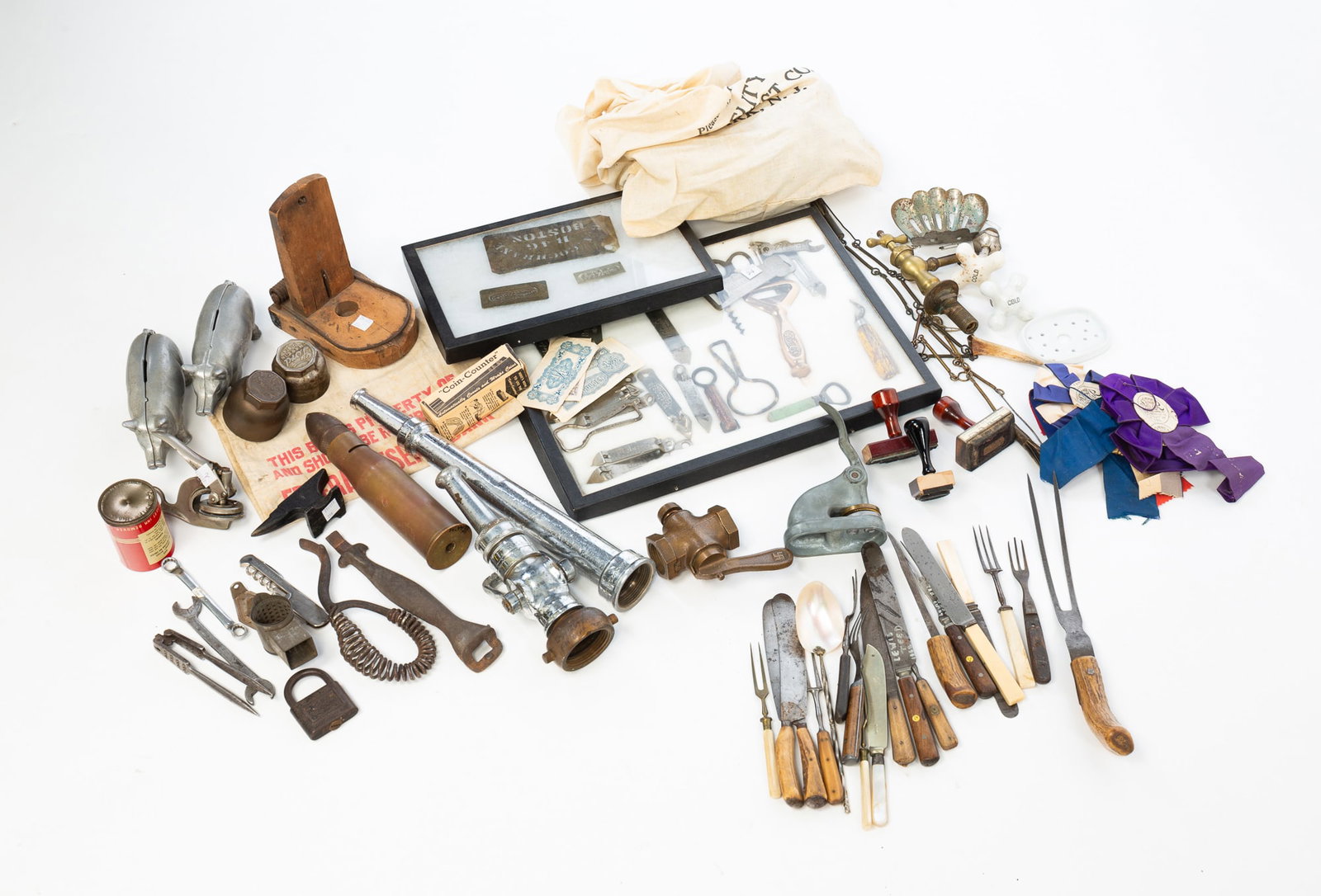LARGE ECLECTIC GROUP OF HOUSEHOLD ITEMS AND TOOLS.: LARGE ECLECTIC GROUP OF HOUSEHOLD ITEMS AND TOOLS. American, 19th-20th Century. Comprising several utensils, some with antler or bone handles, several can and bottle openers, two pig banks, a large bu