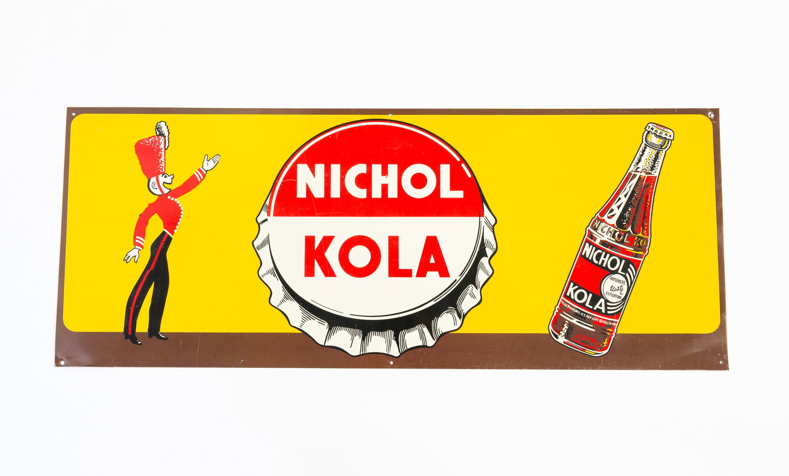 AMERICAN "NICHOL KOLA" TIN LITHOGRAPH ADVERTISING SIGN.: AMERICAN "NICHOL KOLA" TIN LITHOGRAPH ADVERTISING SIGN. Second half 20th Century. Bright colors with central bottle cop flanked by a man in uniform and bottle. 11.75"h. 29.5"w. Provenance: From the