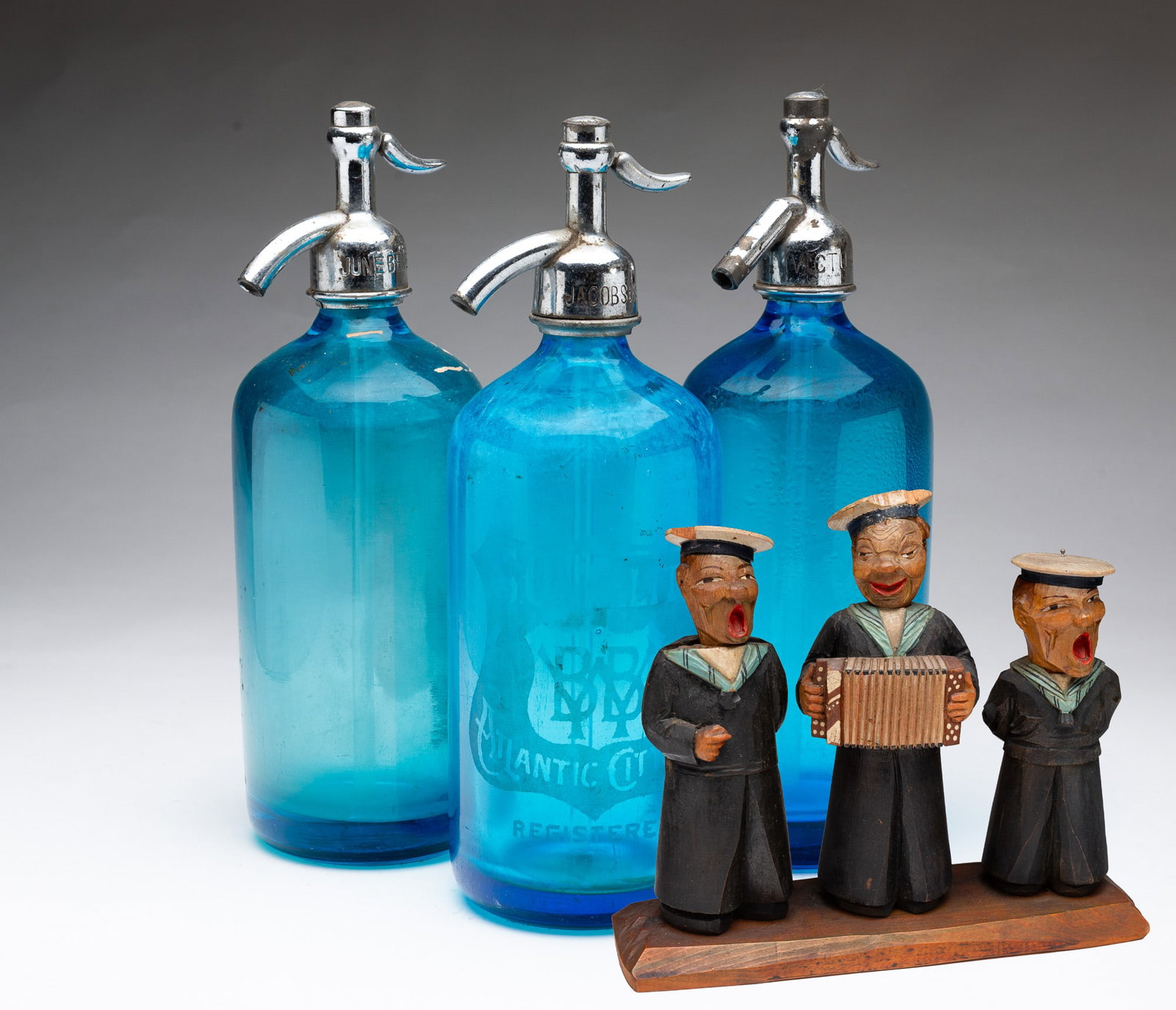 FOLKSY CARVED WOOD SAILOR BAR TOOLS AND THREE SELTZER BOTTLES. (1 of 8)