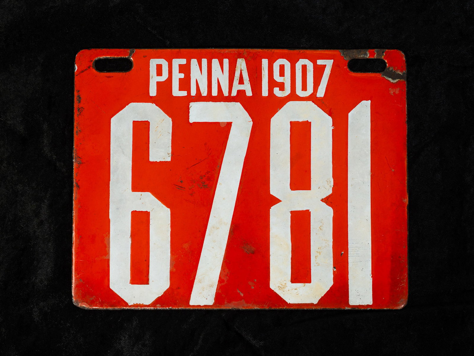 PENNSYLVANIA 1907 ENAMELED LICENSE PLATE BY INGRAM RICHARDSON.: PENNSYLVANIA 1907 ENAMELED LICENSE PLATE BY INGRAM RICHARDSON. American. Iron, orange enamel front, while lettering "PENNA 1907" and license number "6781". Enamel back labeled "Ingram Richardson, Beav