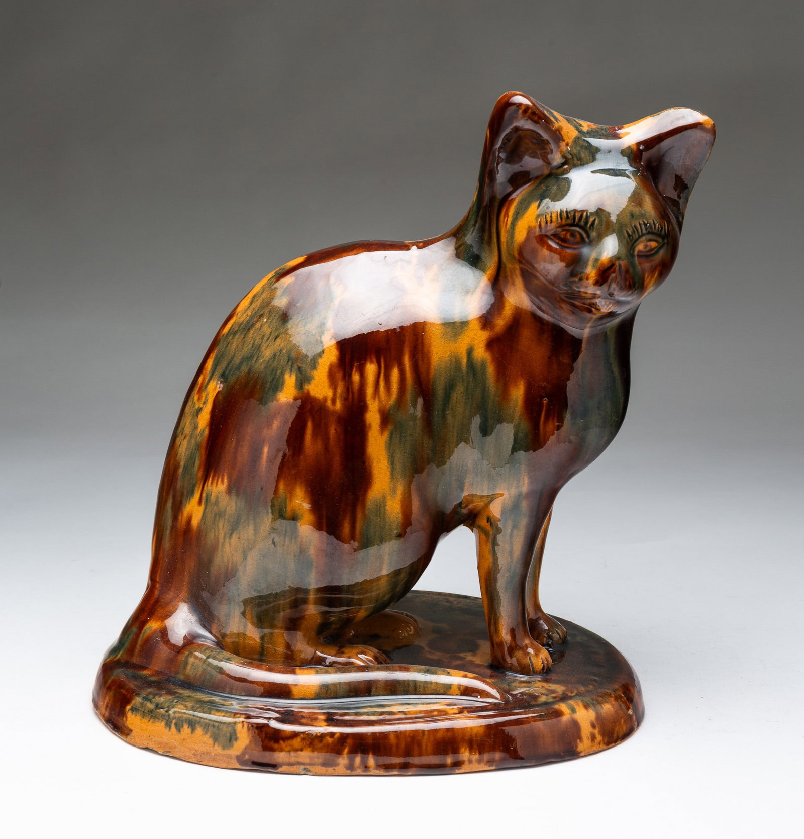 SCARCE AND FINE EAST LIVERPOOL, OHIO BUFF CLAY CAT WITH FENTON FLINT ENAMEL GLAZE. (1 of 5)