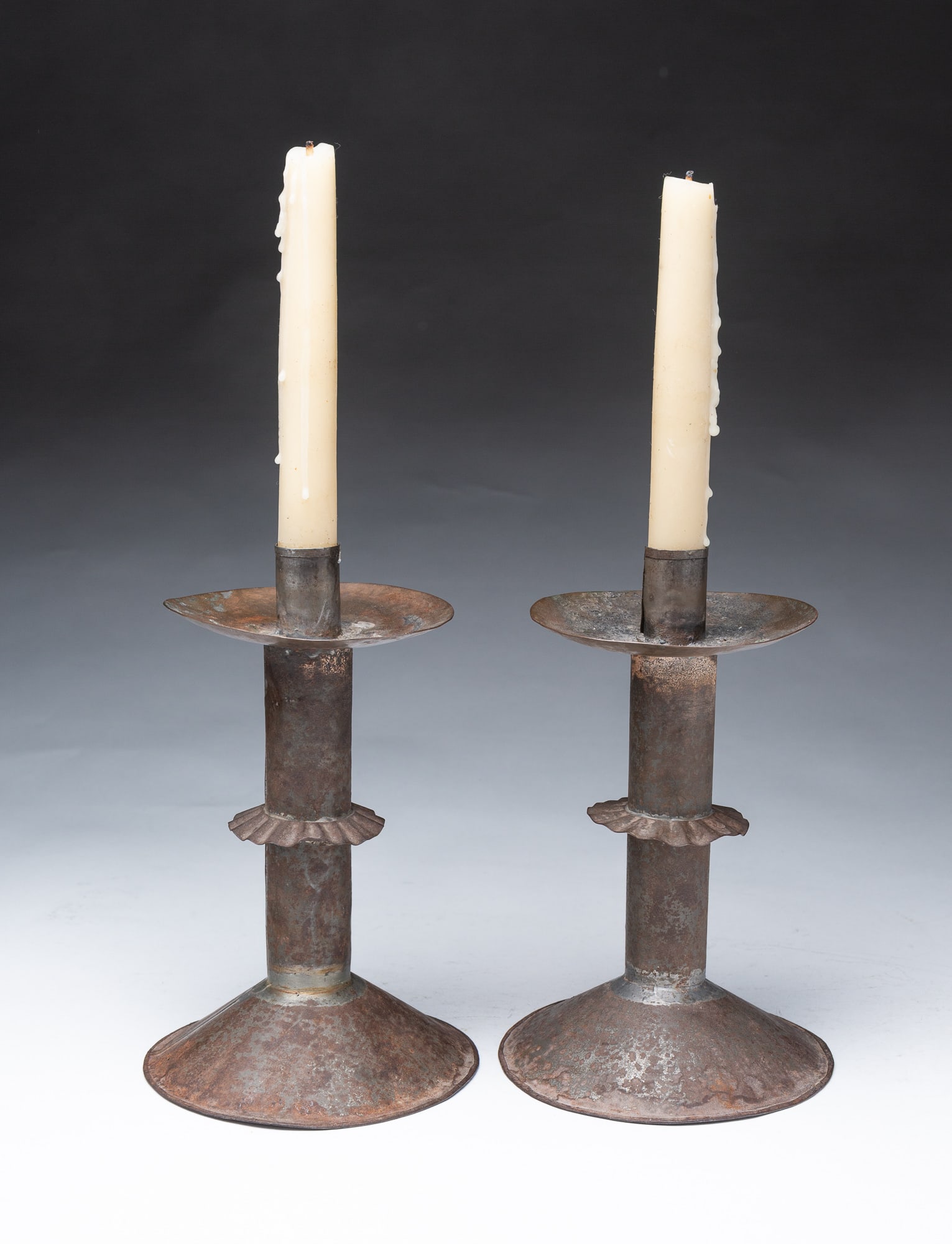 PAIR OF TIN AND COPPER CANDLESTICKS. (1 of 4)