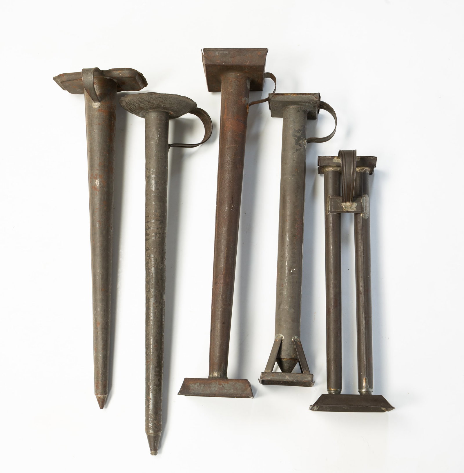 FIVE LARGE TAPER TIN CANDLE MOLDS. (1 of 3)