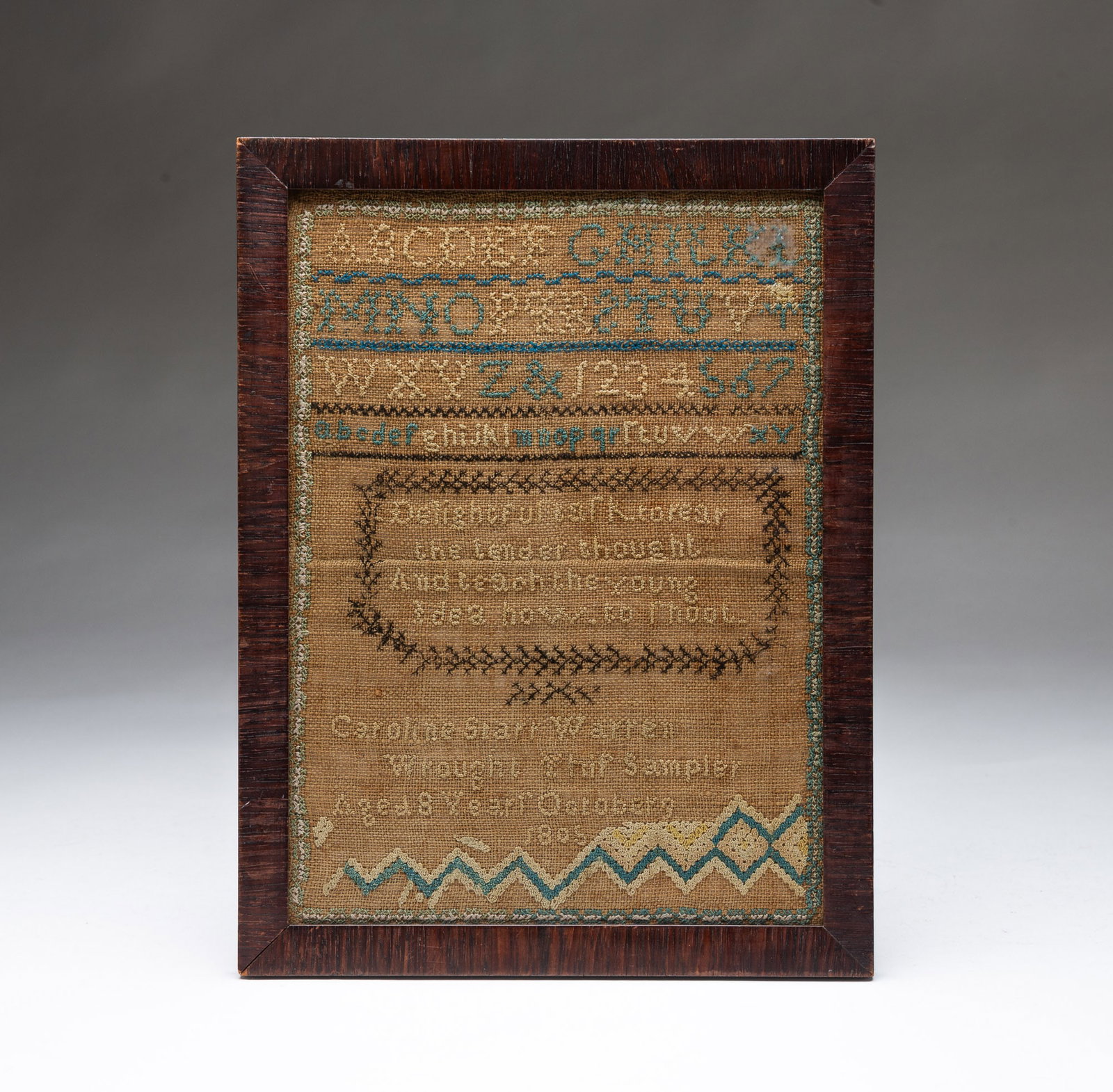 CAROLINE STARR WARREN (AMERICAN, B. 1797) NEEDLEWORK SAMPLER, DATED 1805.: CAROLINE STARR WARREN (AMERICAN, B. 1797) NEEDLEWORK SAMPLER, DATED 1805. Colored thread on linen. Rows of alphabets and numerals, four lines of verse, and signed "Caroline Starr Warren / wrought this