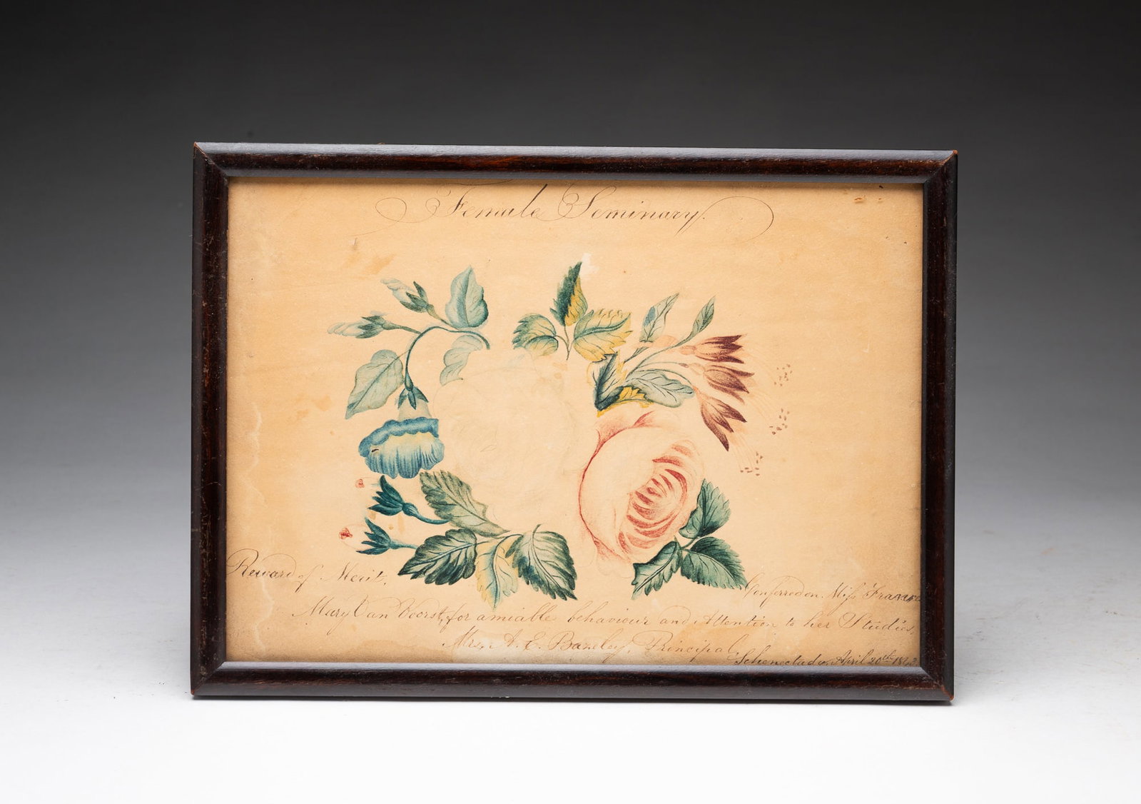 WATERCOLOR AND INK "REWARD OF MERIT" FOR MISS FRANCES MARY VAN VORST, DATED 1843.: WATERCOLOR AND INK "REWARD OF MERIT" FOR MISS FRANCES MARY VAN VORST, DATED 1843. American, 19th Century. Inscribed "Female Seminary" above a bouquet of roses, above further inscription reading "