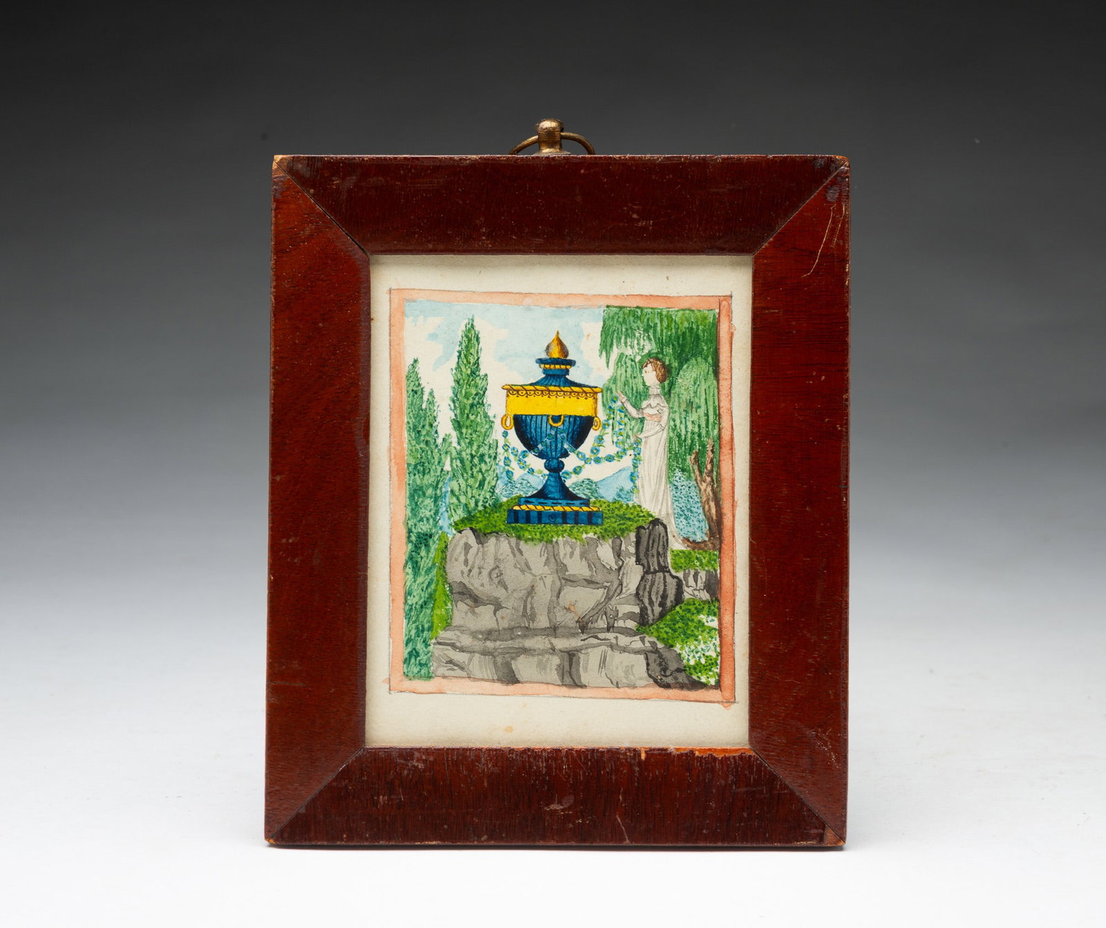 MINIATURE MEMORIAL WATERCOLOR ON PAPER OF A CLASSICAL URN.: MINIATURE MEMORIAL WATERCOLOR ON PAPER OF A CLASSICAL URN. American, 19th Century. Depicting a large blue and gilt urn with onion-form finial atop a rock outcropping with a figure draped in white