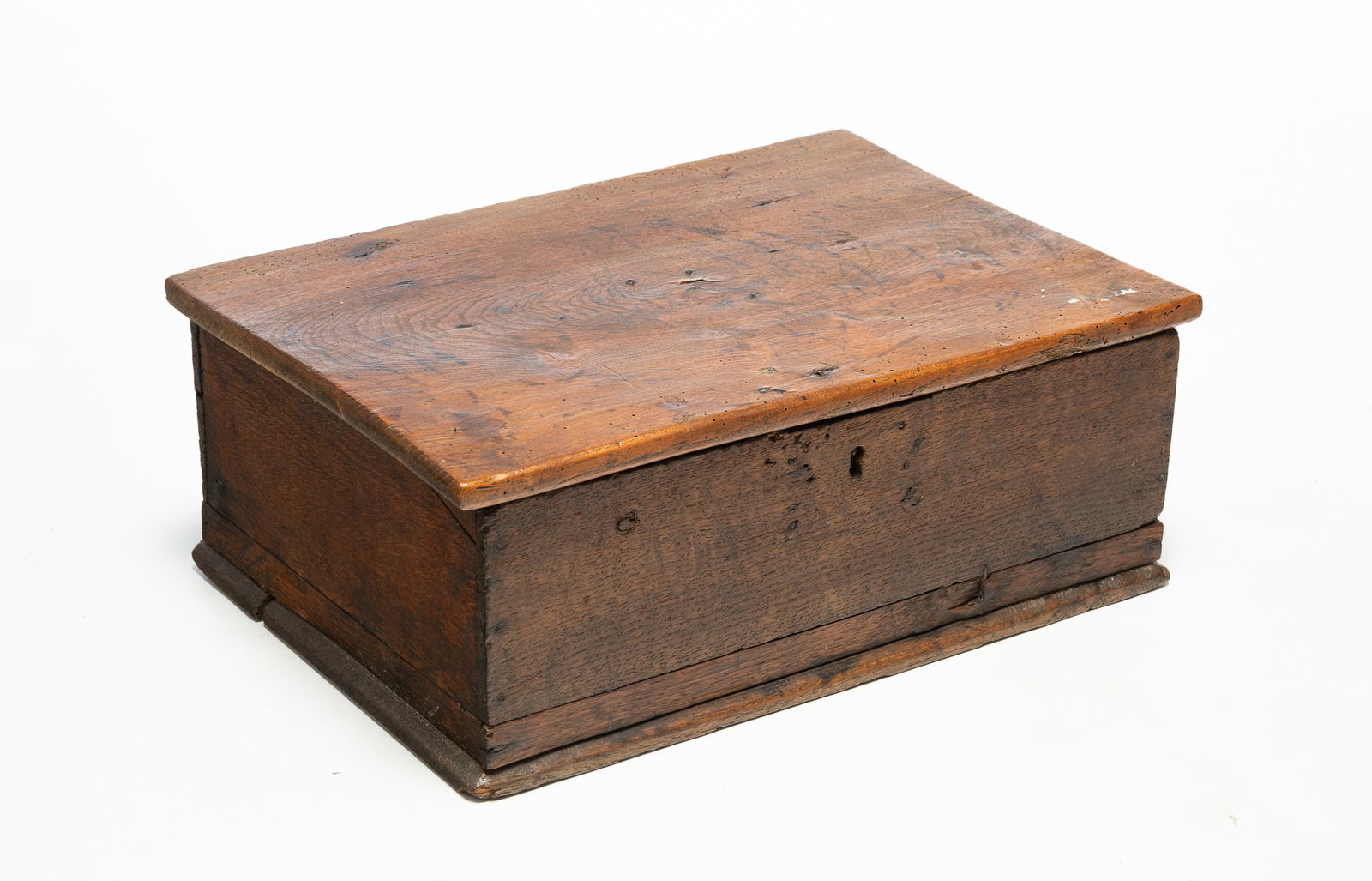 OAK BIBLE BOX.: OAK BIBLE BOX. English, Second half 18th Century. One board top, case with simple construction, base with routed edge, and strap hinges. 7"h. 18"w. 12.5"d. Provenance: From the Lifetime Collection of 