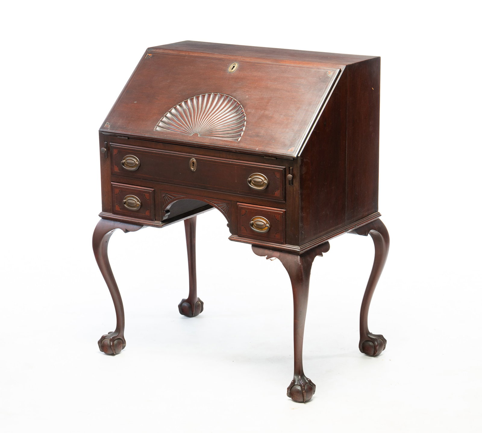 CHIPPENDALE STYLE MAHOGANY LADIES DESK.: CHIPPENDALE STYLE MAHOGANY LADIES DESK. American, 20th Century. Slant front with carved shell, fitted interior with shell carved prospect door, file drawers, dovetailed drawers and pigeon holes,