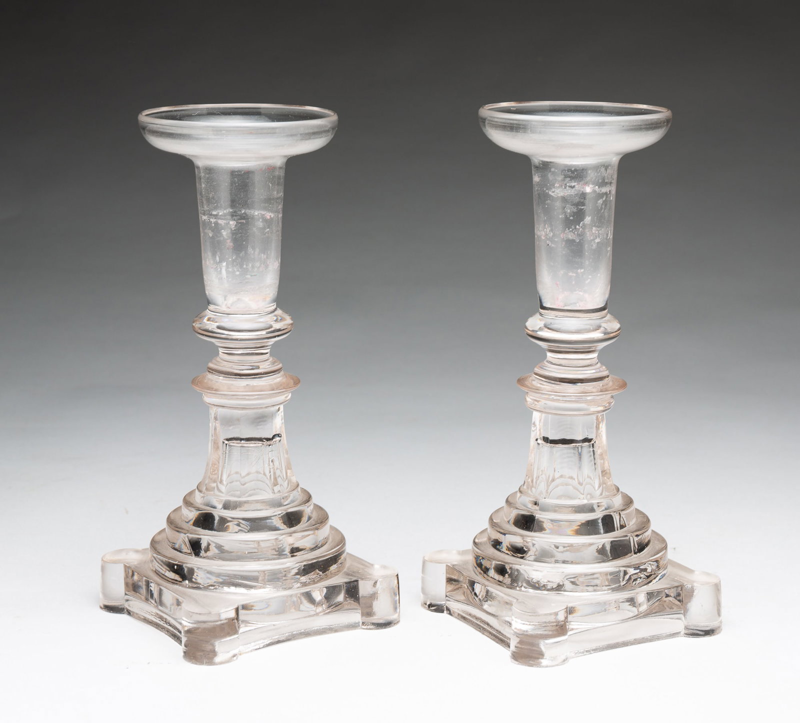 PAIR OF FLINT GLASS CANDLESTICKS. (1 of 3)
