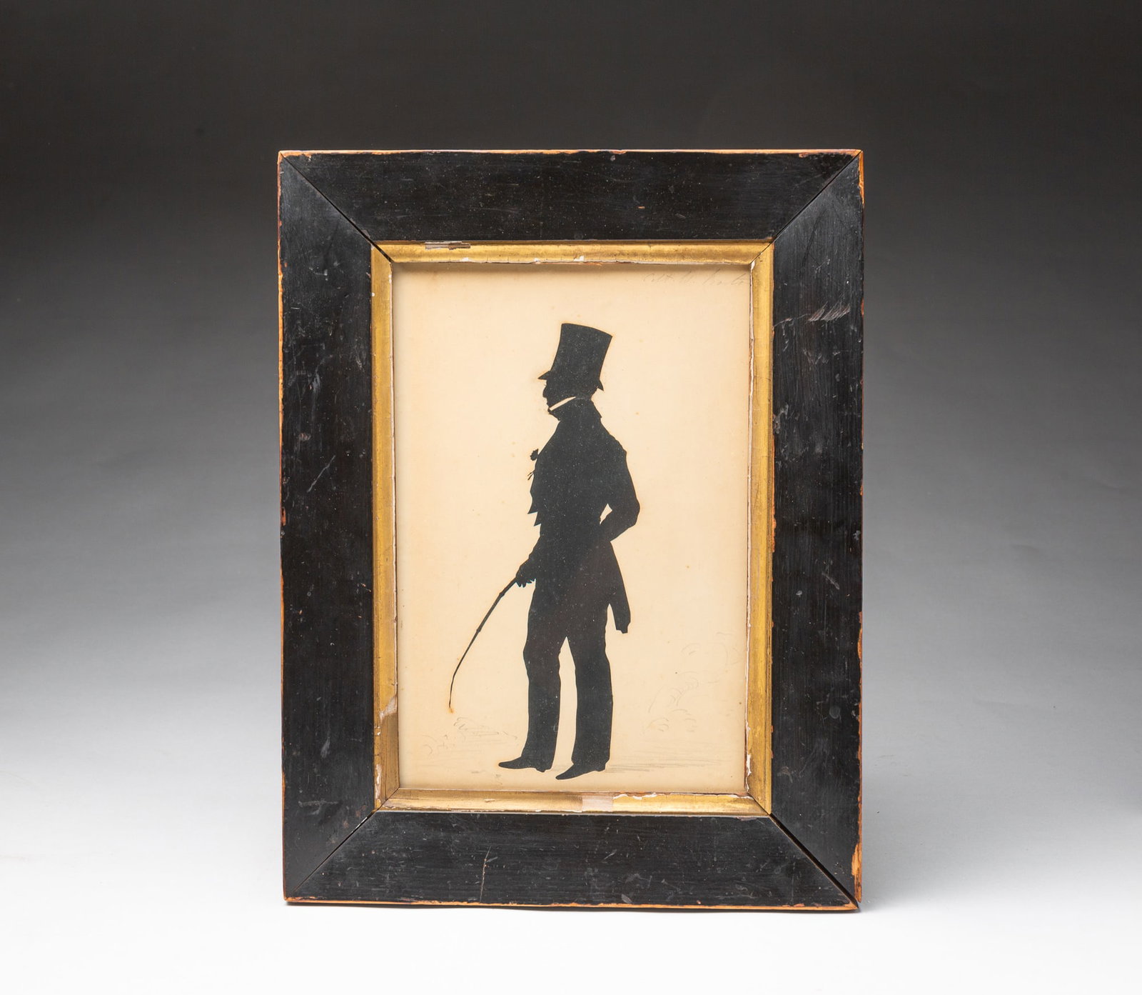 AUGUSTE EDOUART (FRENCH, 1788-1861; ACTIVE IN THE U.S. 1839-1849) CUT PAPER FULL-LENGTH SILHOUETTE: AUGUSTE EDOUART (FRENCH, 1788-1861; ACTIVE IN THE U.S. 1839-1849) CUT PAPER FULL-LENGTH SILHOUETTE OF CAPTAIN W. BARTON. American, 19th Century. Cut paper profile portrait of Captain Barton wearing a