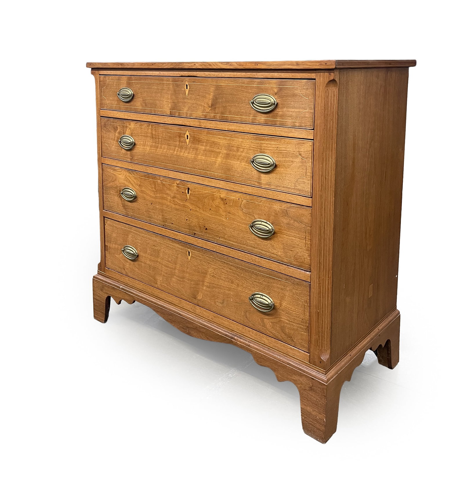 CHIPPENDALE WALNUT AND STRING-INLAID FOUR-DRAWER CHEST.: CHIPPENDALE WALNUT AND STRING-INLAID FOUR-DRAWER CHEST. American, Late 18th Century. Poplar secondary. Top with applied edge moldings, solid ends, chamfered corners, four dovetailed drawers with
