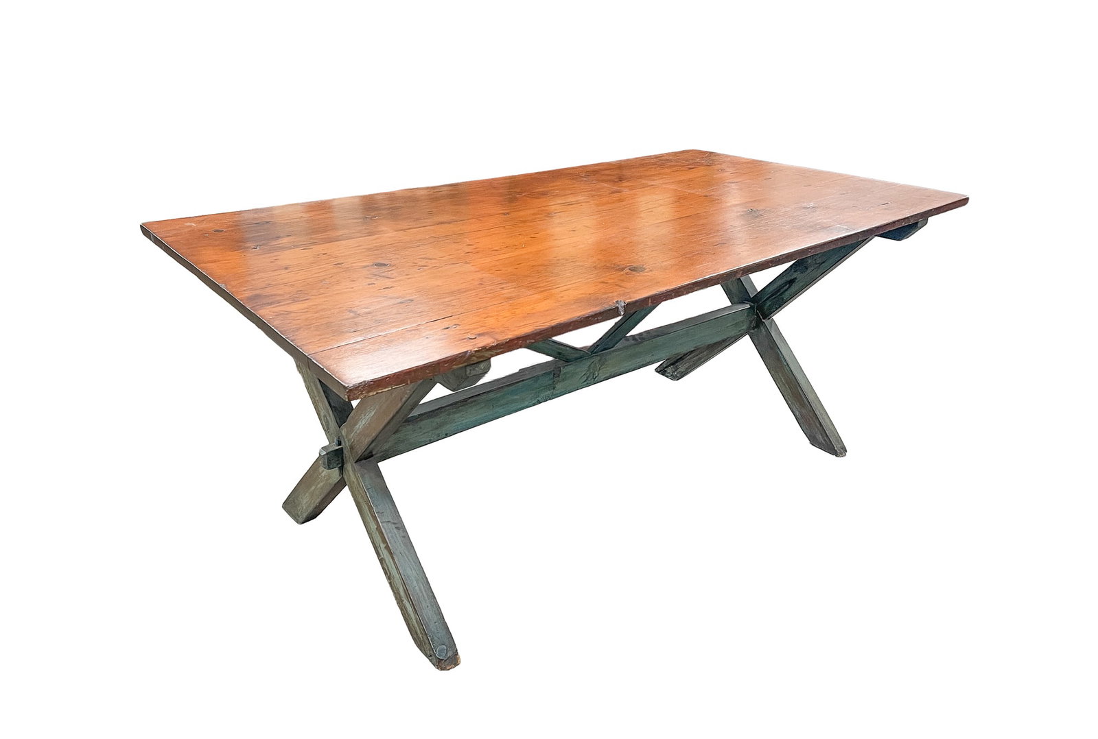 SAWBUCK TABLE WITH DISTRESSED GREEN PAINT.: SAWBUCK TABLE WITH DISTRESSED GREEN PAINT. American, 19th Century. Pine. Finished top pegged to base, "X" ends with stretcher and "V" shaped center support. 30"h. 72.25"w. 38.75"d. Provenance: The Lif