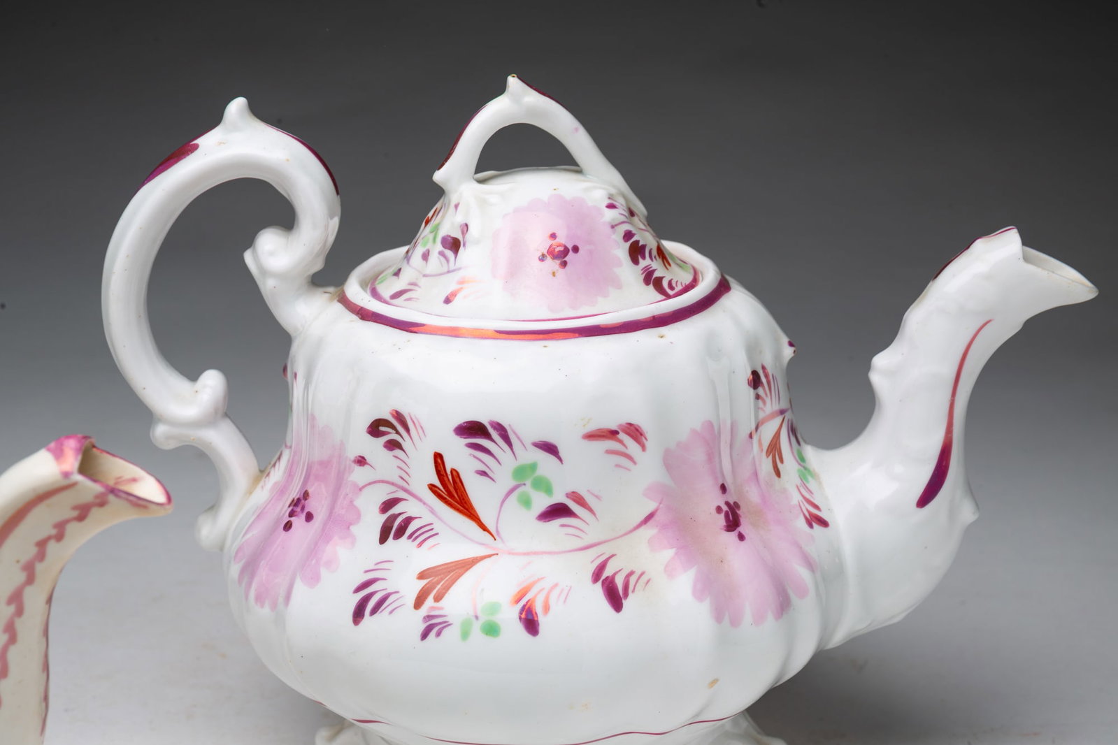 THREE PINK LUSTERWARE TEAPOTS. - 3