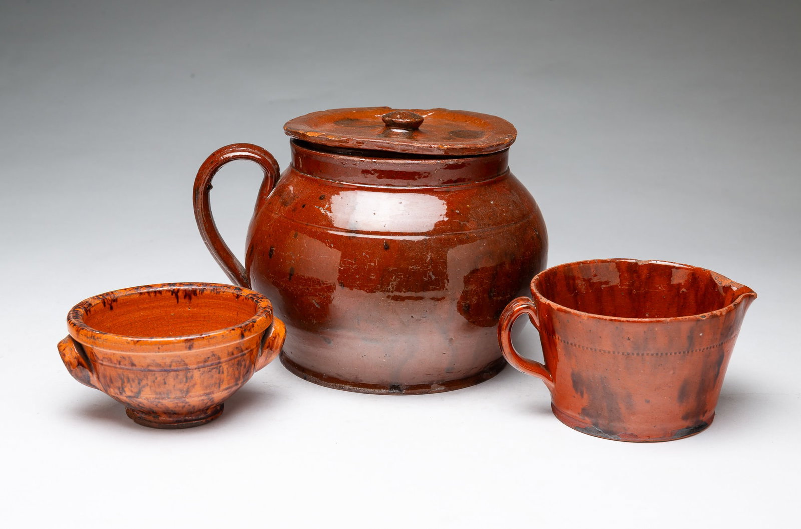 THREE GLAZED REDWARE ITEMS. (1 of 5)