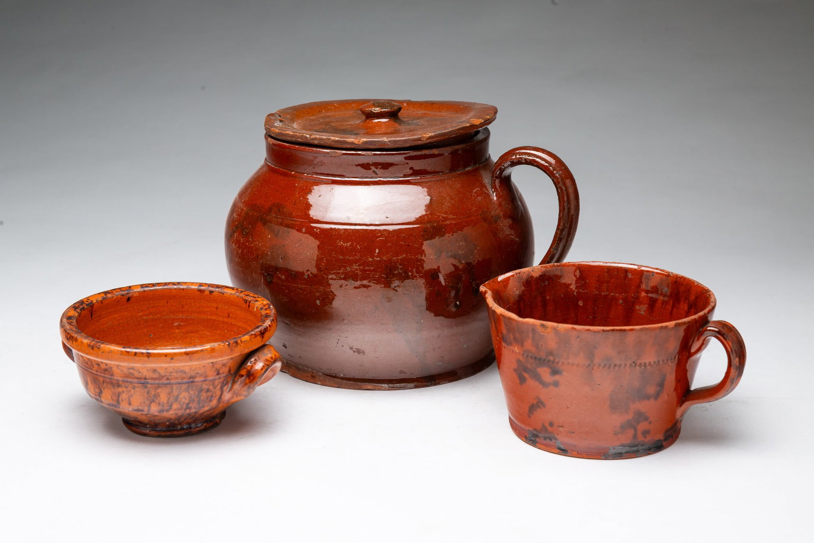 THREE GLAZED REDWARE ITEMS. - 2