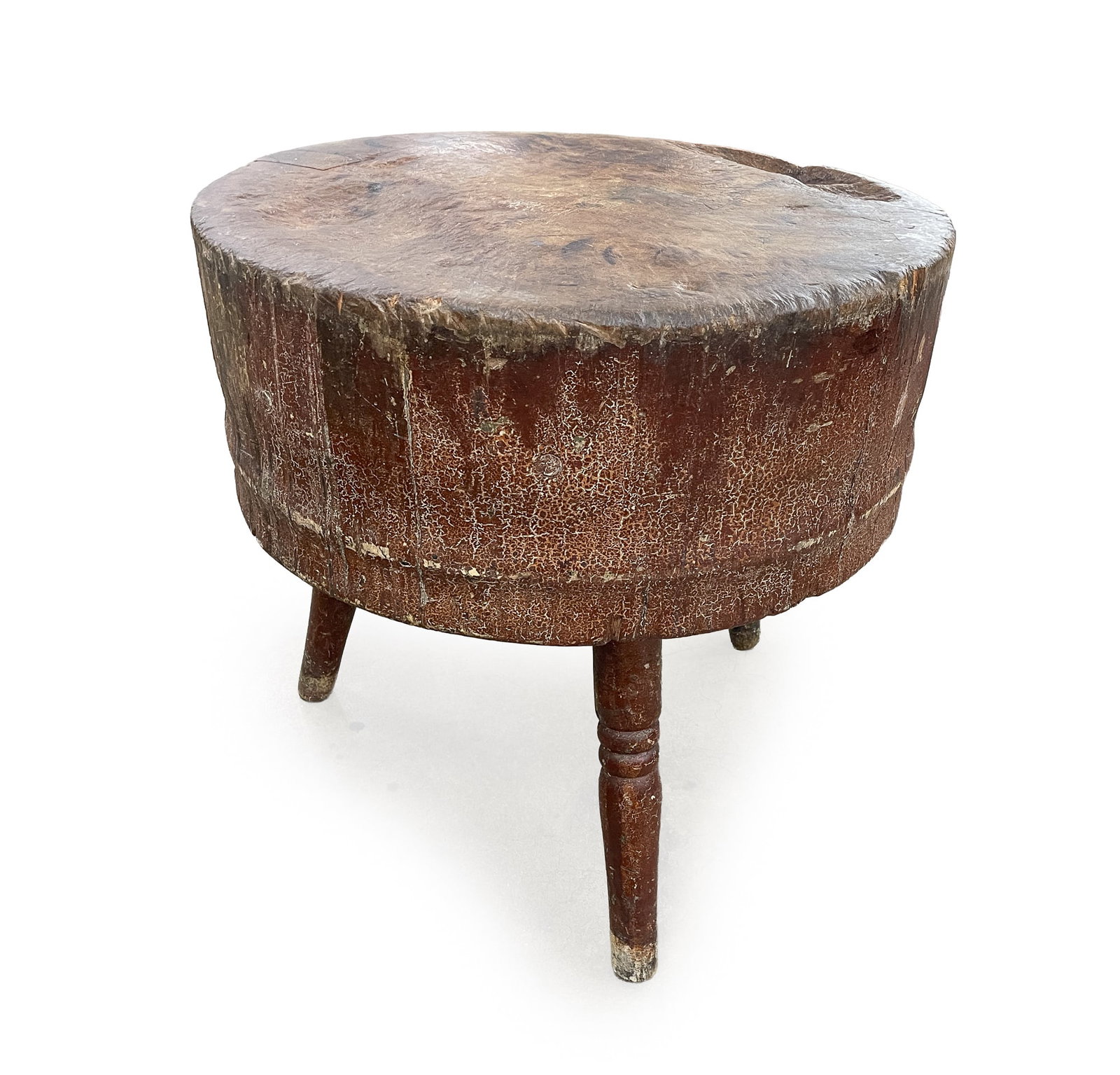 ROUND CHOPPING BLOCK WITH BROWN REPAINT.: ROUND CHOPPING BLOCK WITH BROWN REPAINT. American, Late 19th Century. Turned table with laminated construction and turned legs. 30"h. 30.5"d. Provenance: The Lifetime Collection of Martha Magsig Lynch