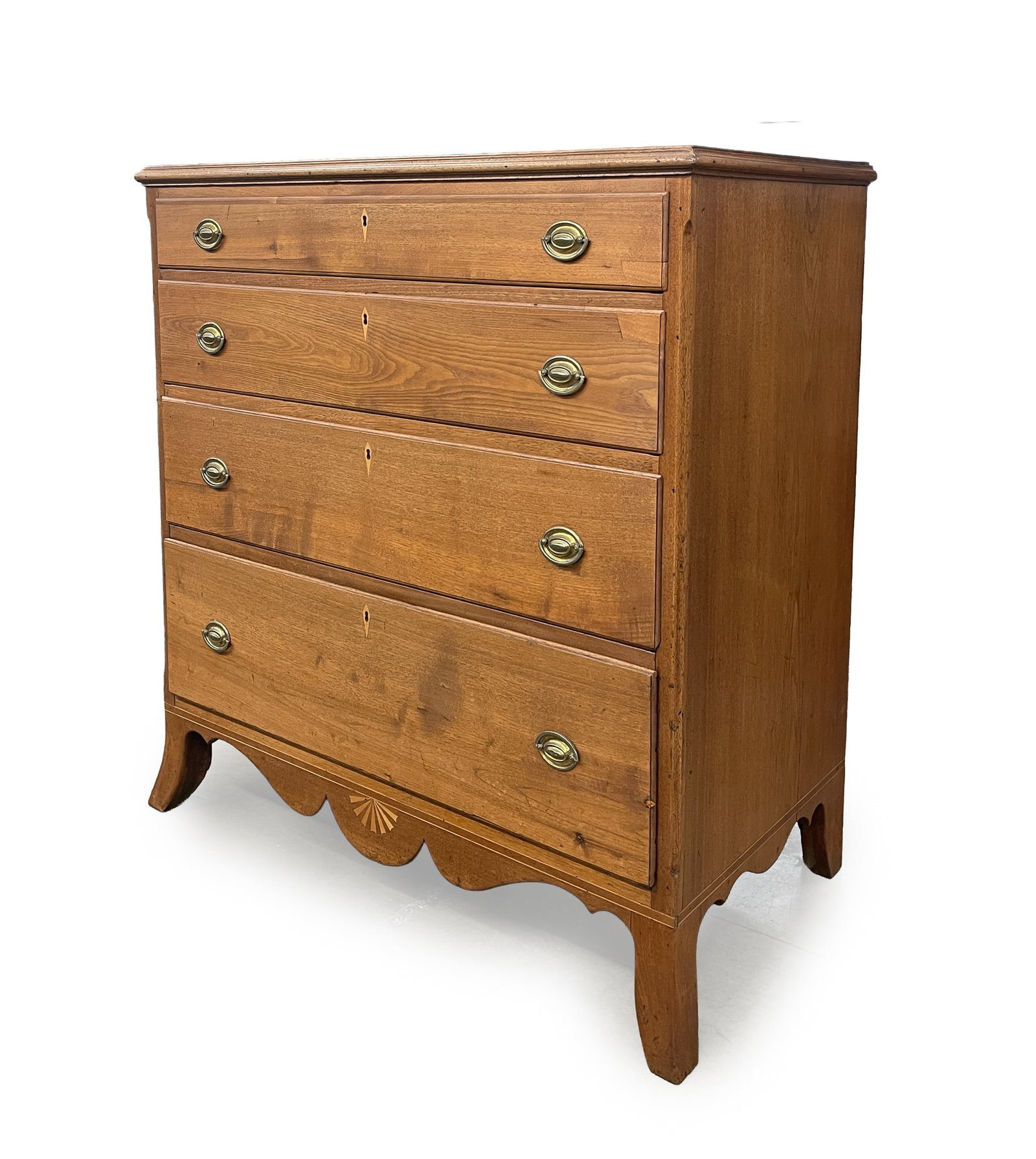 HEPPLEWHITE WALNUT AND MARQUETRY FOUR-DRAWER CHEST.: HEPPLEWHITE WALNUT AND MARQUETRY FOUR-DRAWER CHEST. American, Early 19th Century. Poplar secondary. Top with applied edge moldings, solid ends, chamfered corners, four overlapping dovetailed drawers,