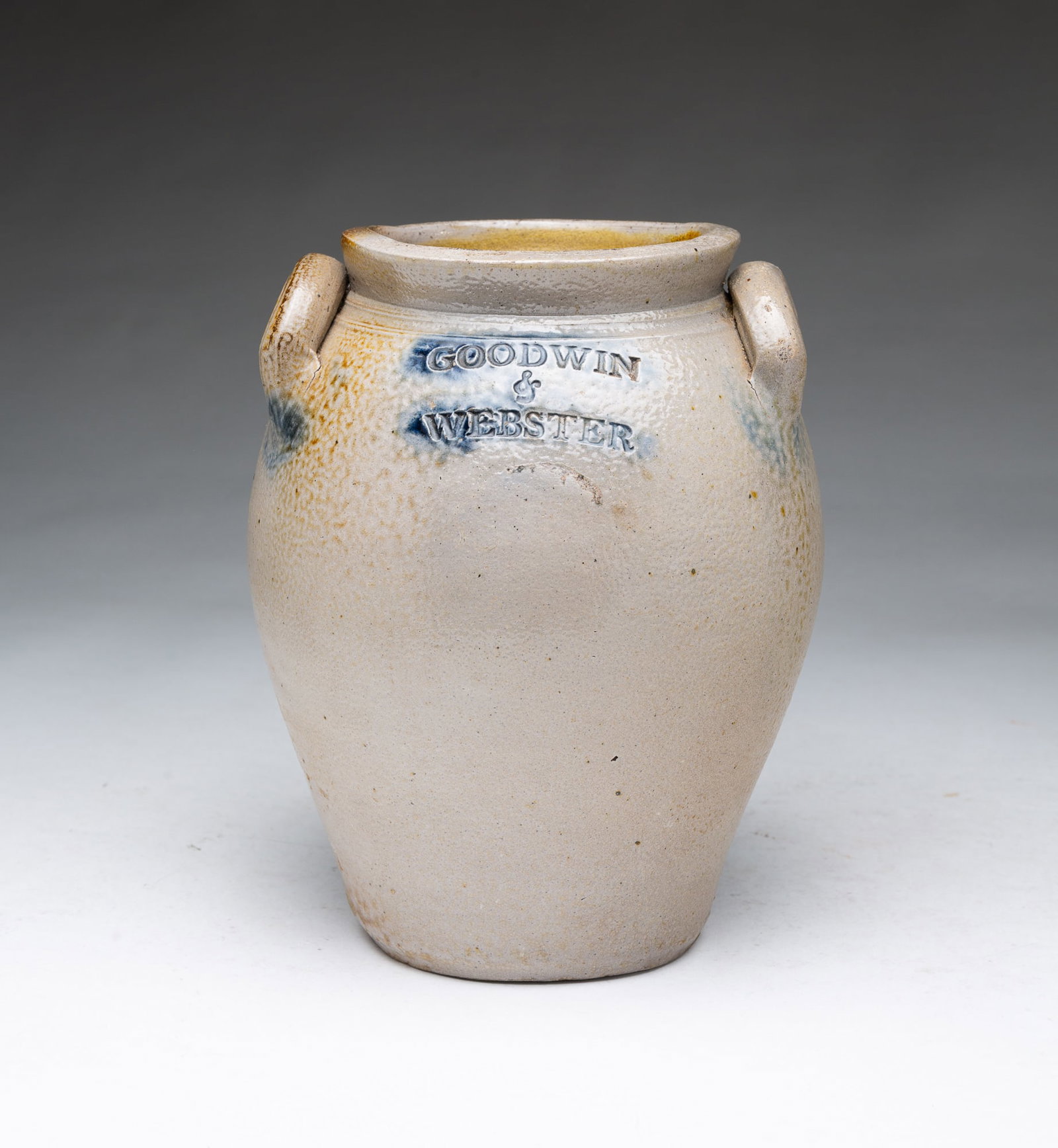 DIMINUTIVE GOODWIN & WEBSTER (CONNECTICUT) COBALT-DECORATED TWO-HANDLED STONEWARE JAR.: DIMINUTIVE GOODWIN & WEBSTER (CONNECTICUT) COBALT-DECORATED TWO-HANDLED STONEWARE JAR. American, 19th Century. Of ovoid form with pronounced and slightly flared and irregular top rim, tooled collar, a