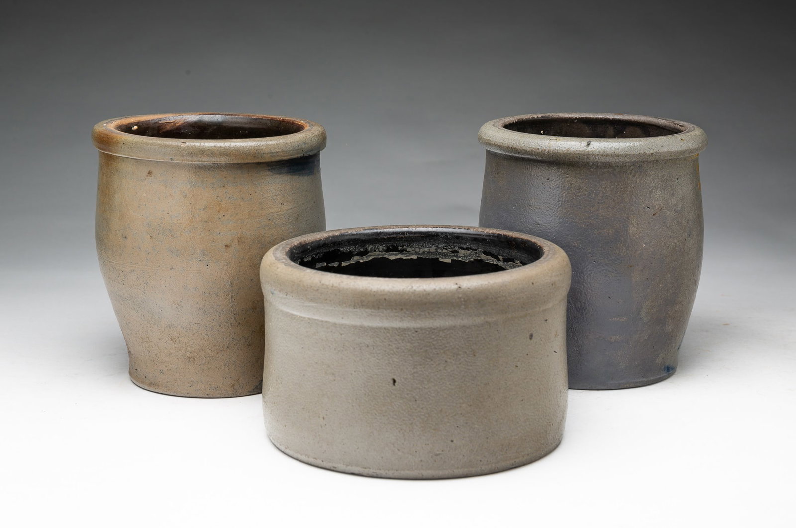 THREE COBALT-DECORATED STONEWARE JARS. - 3