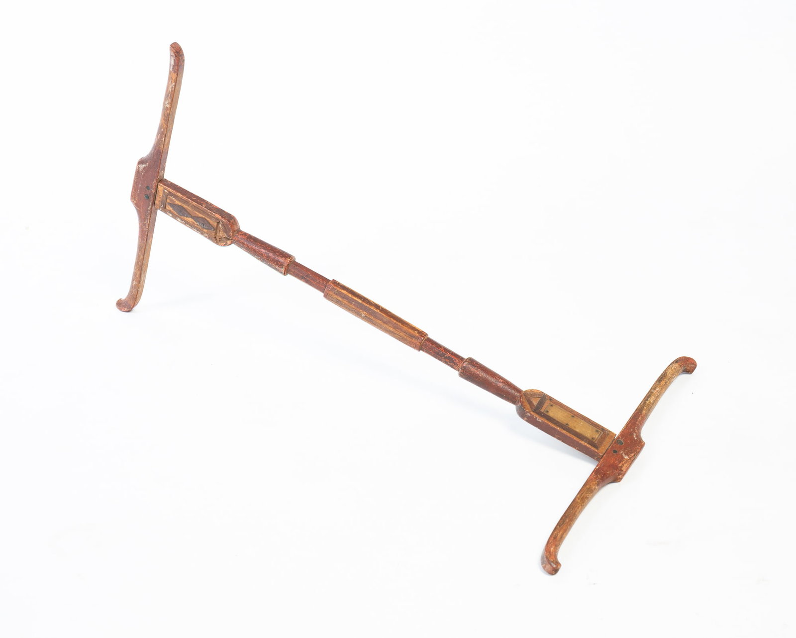 CARVED WOODEN NIDDY NODDY WITH ORIGINAL PAINT AND VERSE.: CARVED WOODEN NIDDY NODDY WITH ORIGINAL PAINT AND VERSE. American, 19th Century. Carved center standard, one end having typed poetic verses encased by celluloid on each side, the other end having