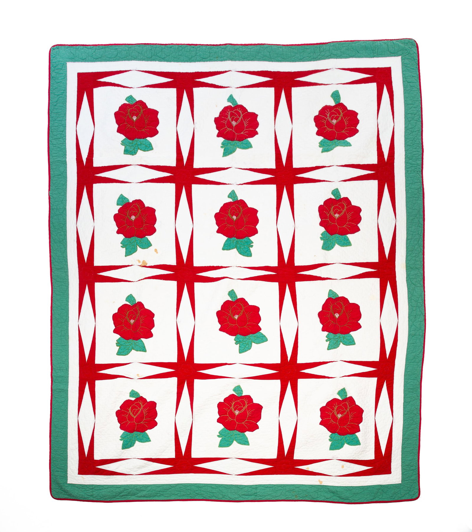 COTTON APPLIQUE EIGHT-POINT STAR AND ROSE QUILT.: COTTON APPLIQUE EIGHT-POINT STAR AND ROSE QUILT. American, mid-20th Century. Hand-stitched. In solid green and red on a white background. Roses have embroidered detail. Provenance: From the Lifetime