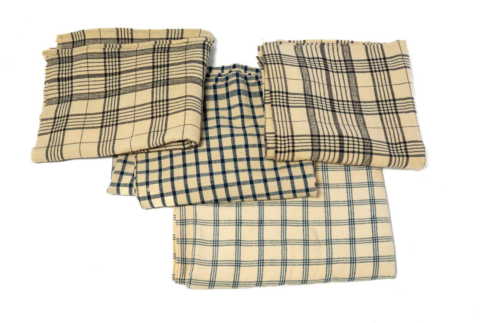 FOUR HOMESPUN TEXTILES.: FOUR HOMESPUN TEXTILES. American, 19th Century. All blue and cream plaid. Two one-piece blankets, 64"l. 66"w. and 65"l. 69"w. Together with two two-piece blankets with hand-stitched center seams,