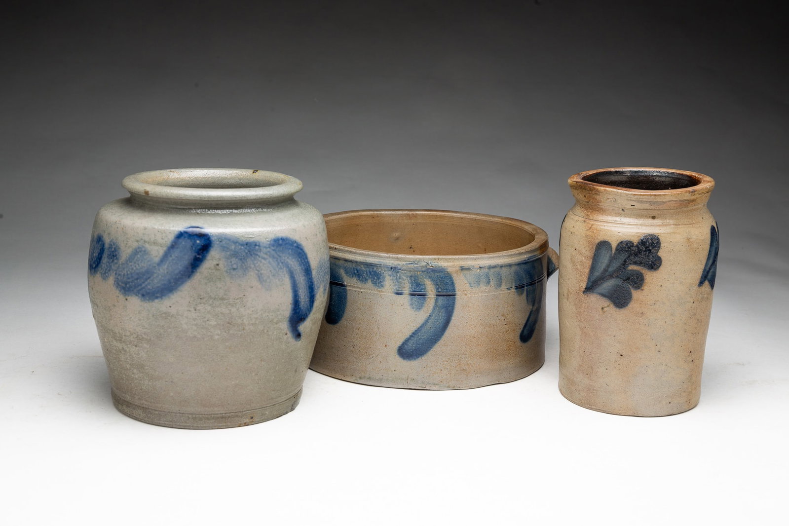 THREE COBALT-DECORATED STONEWARE JARS. - 3