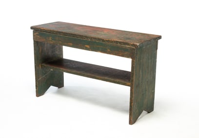 CROCK BENCH IN LAYERED GREEN PAINT.