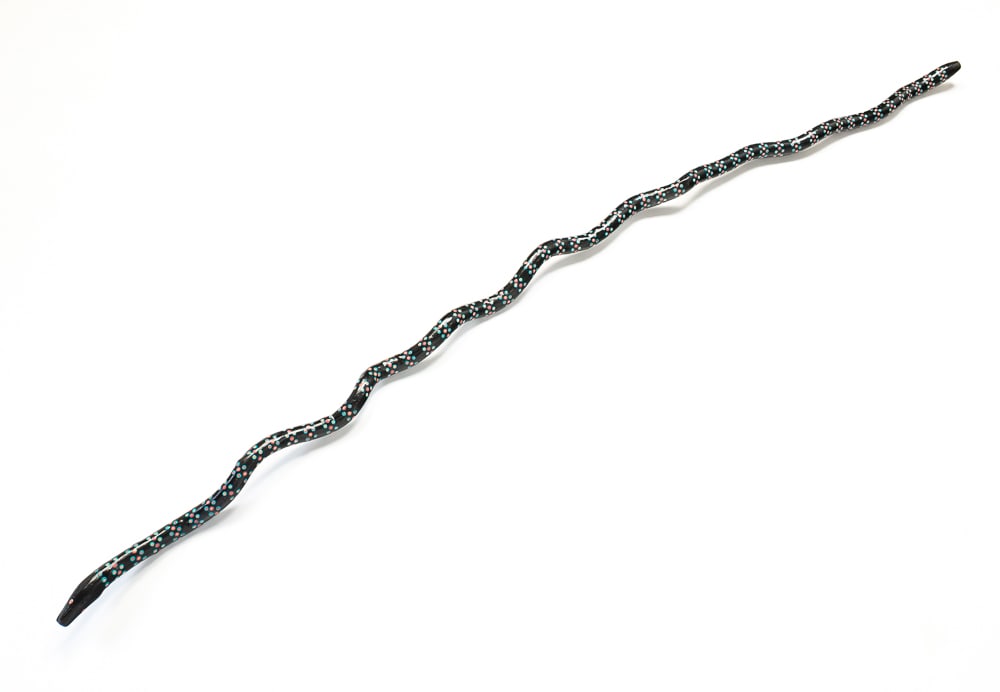 SIGNED FOLK ART FREE-FORM PAINTED SNAKE STAFF.: SIGNED FOLK ART FREE-FORM PAINTED SNAKE STAFF. American, 20th Century. Polychrome decoration on wooden staff. Signed "Tracy Winegor 8/90". 71.25"l.