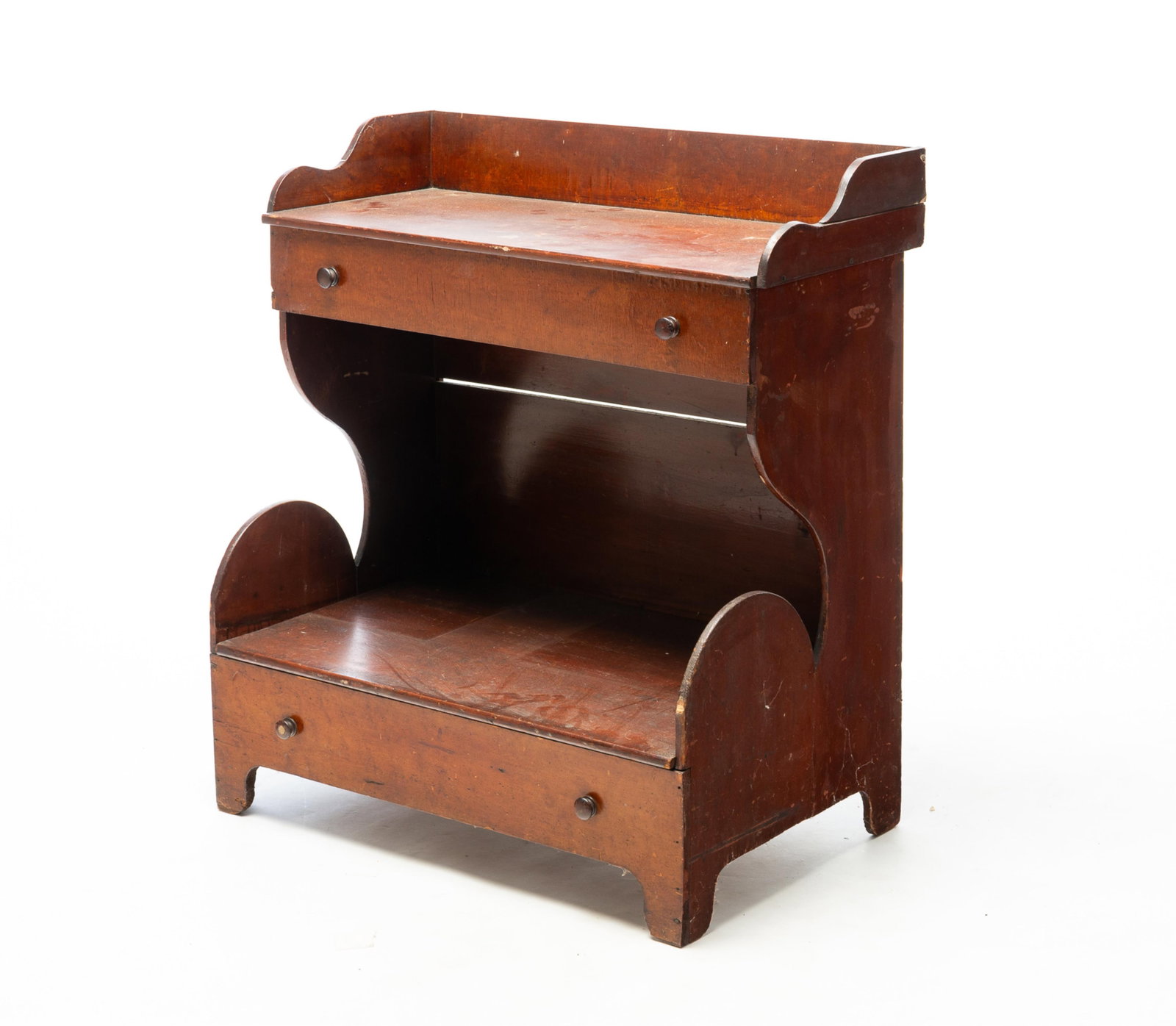 UNUSUAL FOLKSY STAND WITH DRAWERS.: UNUSUAL FOLKSY STAND WITH DRAWERS. American, 19th Century. Poplar with birdseye maple veneer. Gallery back, boldly shaped ends with simple cut-out feet, top and base with false drawer fronts, hinged