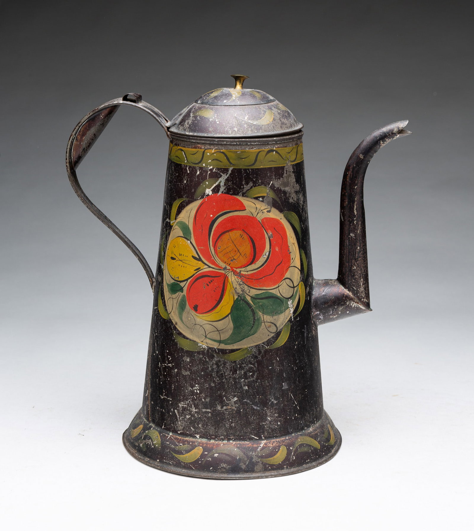 TOLE COFFEE POT.: TOLE COFFEE POT. American, 19th Century. Lighthouse-shaped with gooseneck spout and flared base, painted with flowers and leaves on a cream ground surrounded by stylized yellow flourishes. 10.75"h.