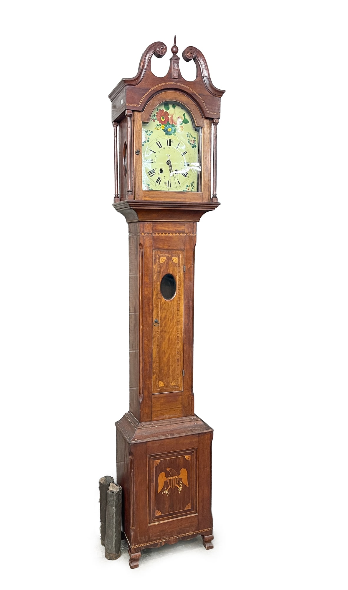 INLAID TALL CASE CLOCK.: INLAID TALL CASE CLOCK. American, Early 19th Century. Cherry. Bonnet with broken arch pediment, turned finial, tombstone arched door, elliptically shaped sidelights, and slender turned pilasters. Case
