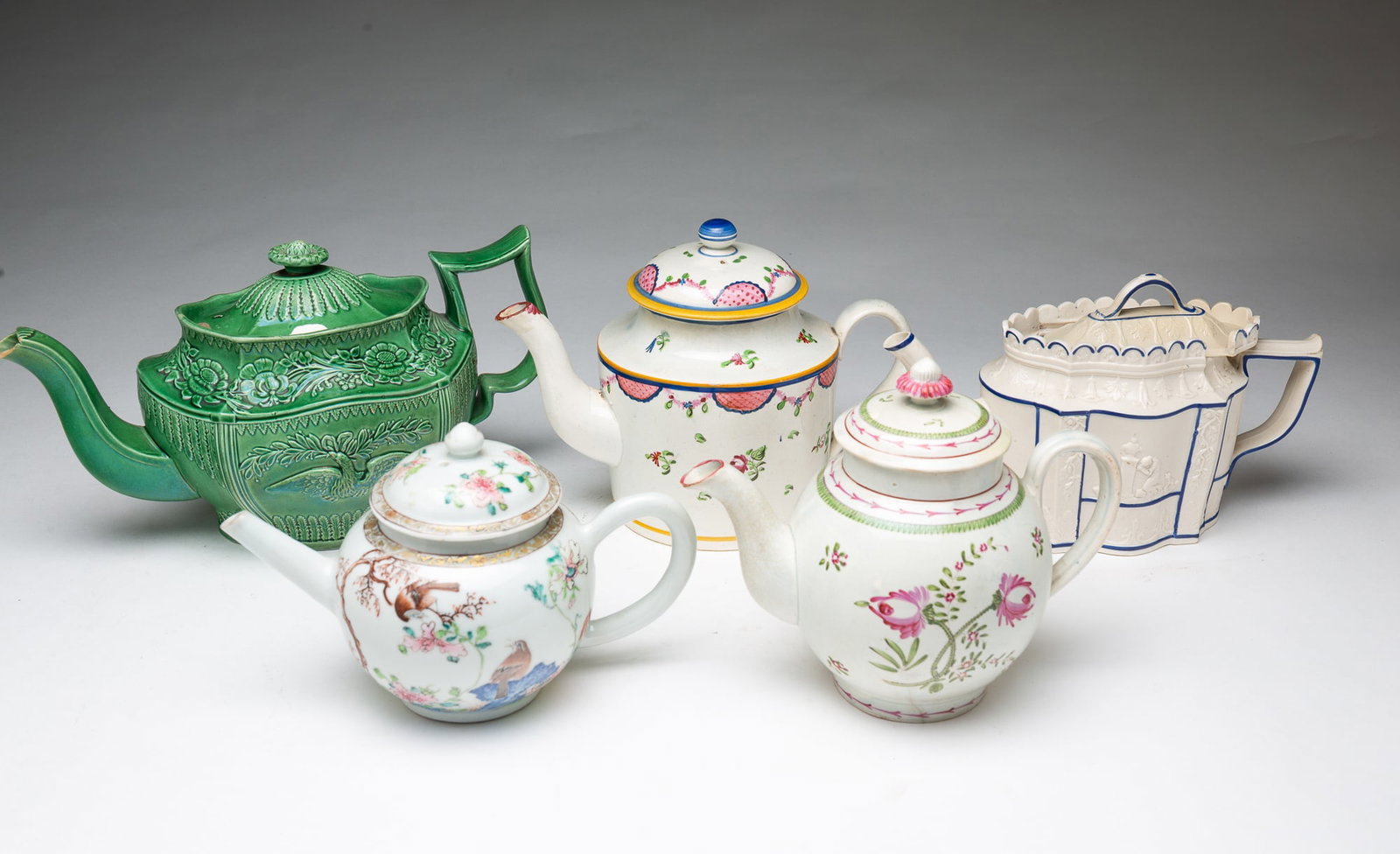 FIVE LIDDED TEAPOTS WITH VARIOUS DESIGNS. - 2