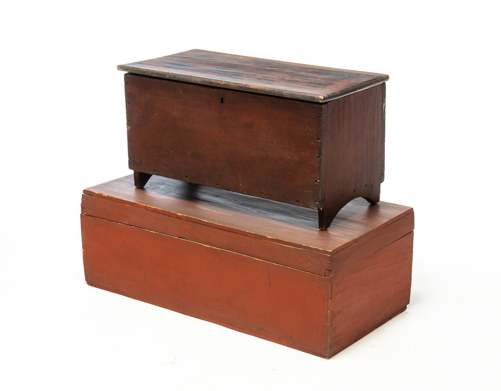 TWO BOXES WITH ORIGINAL PAINT.: TWO BOXES WITH ORIGINAL PAINT. American, 19th Century. A poplar child's size six board blanket chest, half round cut-out legs, original dark finish, and lettered and dated under lid "T. Heimlen 1883".