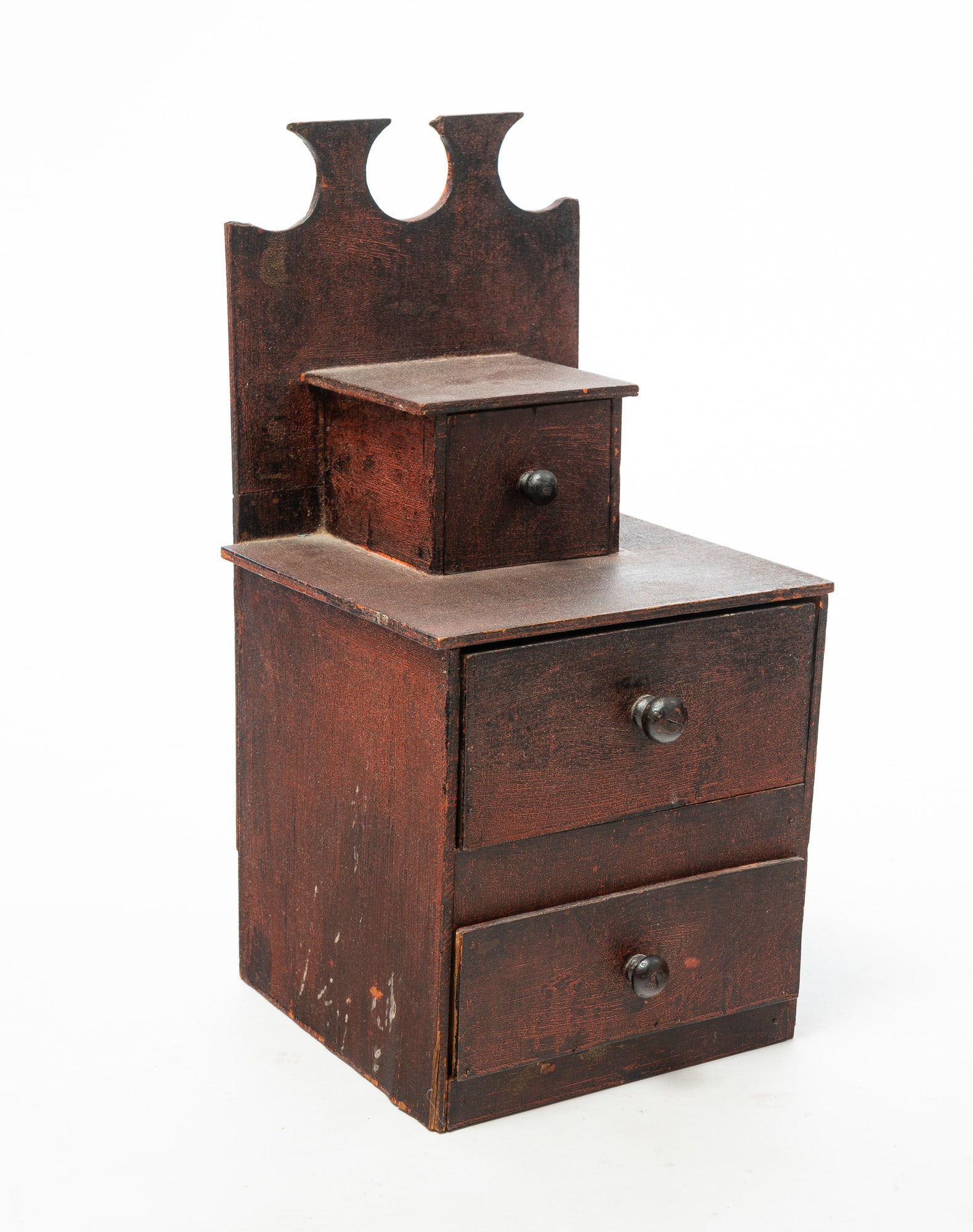 GEORGE ST. PIERRE (AMERICAN) FOLKSY PAINTED CASE OF DRAWERS, DATED 1880.: GEORGE ST. PIERRE (AMERICAN) FOLKSY PAINTED CASE OF DRAWERS, DATED 1880. Late 19th Century. Constructed from packing crates, high back splash, three drawers, original reddish-black paint, and