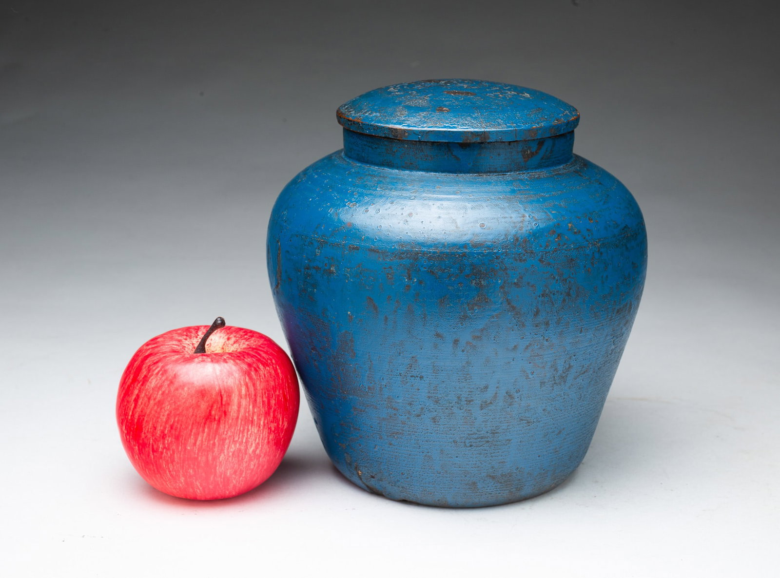 BLUE-PAINTED TURNED WOOD LIDDED JAR.: BLUE-PAINTED TURNED WOOD LIDDED JAR. American, 19th Century. Of ovoid form with fitted lid and old blue paint over dark paint. 7"h.