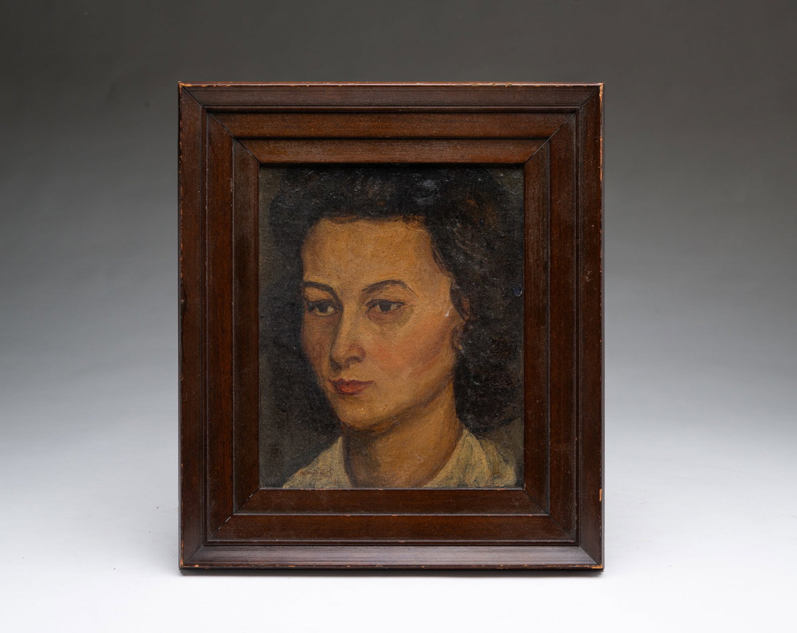 VINCENT CANADÉ (ITALIAN/AMERICAN, 1879-1961) "HEAD OF A GIRL" DIMINUTIVE OIL ON BOARD, DATED 1939.: VINCENT CANADÉ (ITALIAN/AMERICAN, 1879-1961) "HEAD OF A GIRL" DIMINUTIVE OIL ON BOARD, DATED 1939. American, 20th Century. Portrait of a girl with brown hair and pensive expression, looking down and 