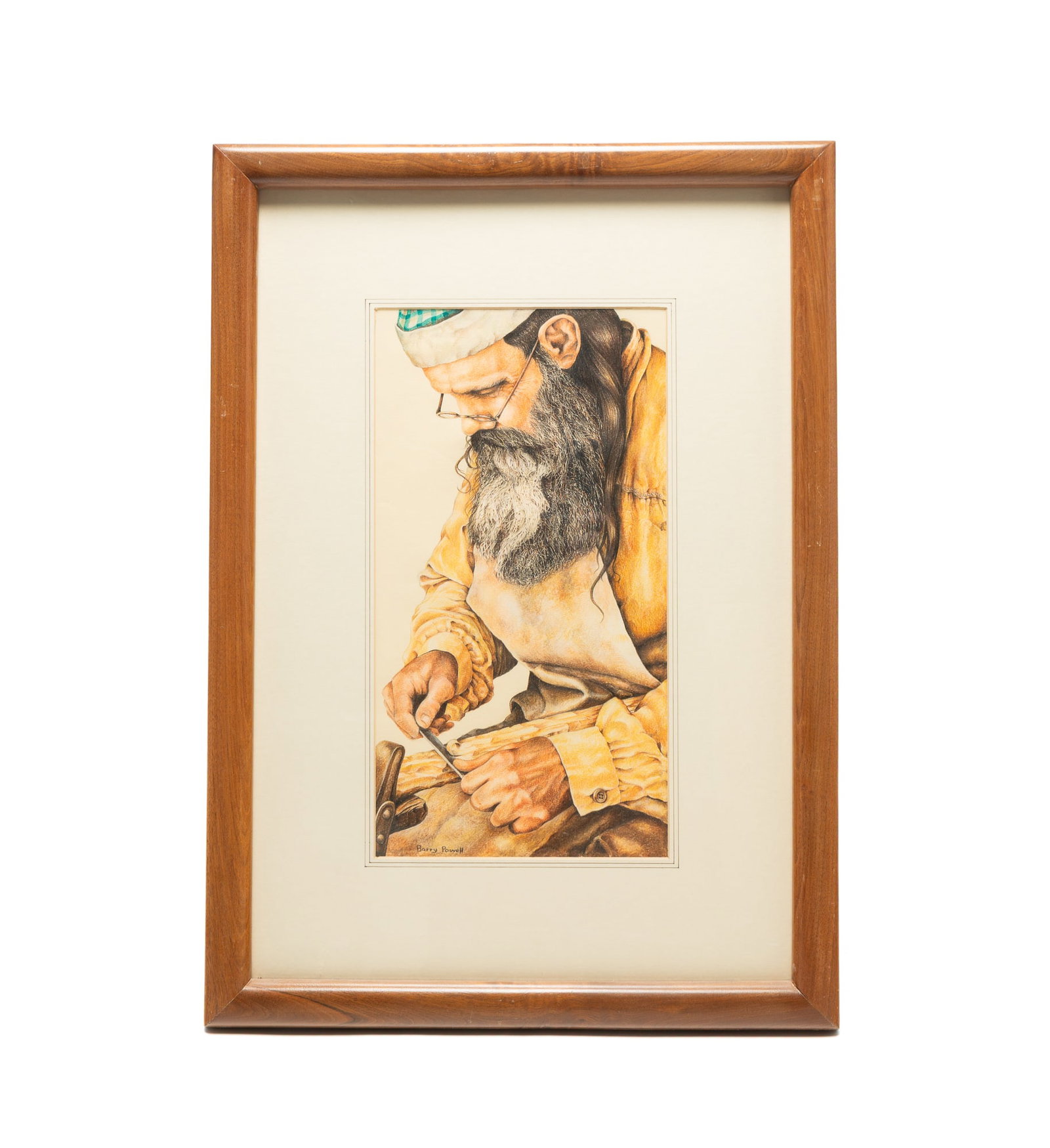BARRY POWELL (INDIANA, B. 1951) "THE CRAFTSMAN" COLORED PENCIL ON PAPER.: BARRY POWELL (INDIANA, B. 1951) "THE CRAFTSMAN" COLORED PENCIL ON PAPER. American, 20th Century. Depicting a man with a beard intently carving a piece of wood. Signed at lower left. Matted and framed 