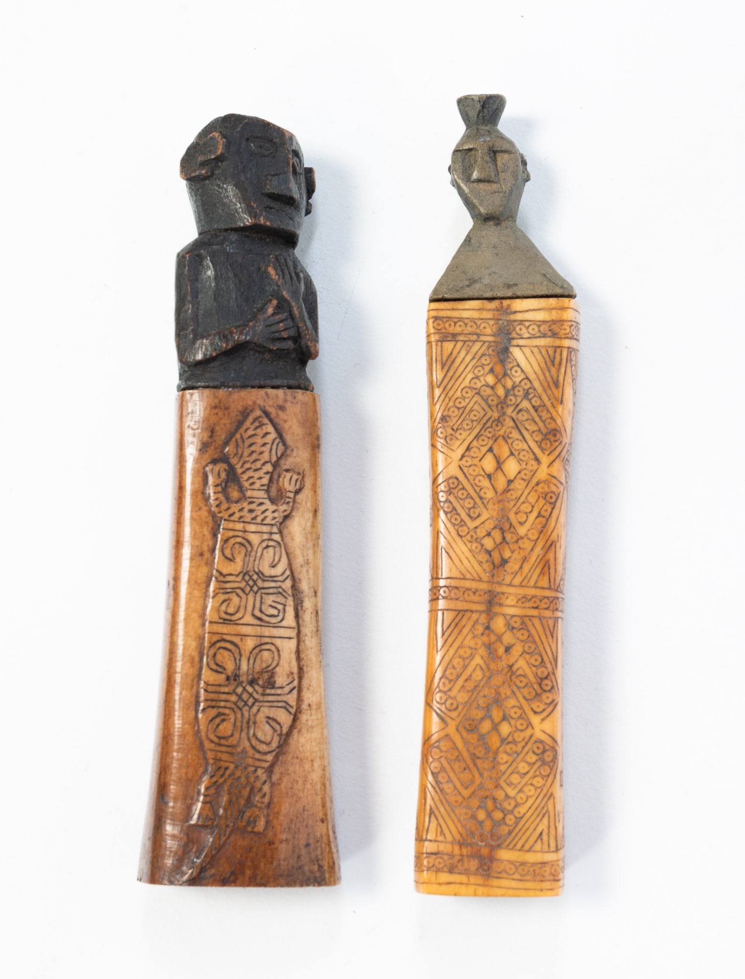 TWO AFRICAN BONE SCRIMSHAW AND CARVED WOOD FIGURAL SNUFF OR MEDICINE BOTTLES. (1 of 3)