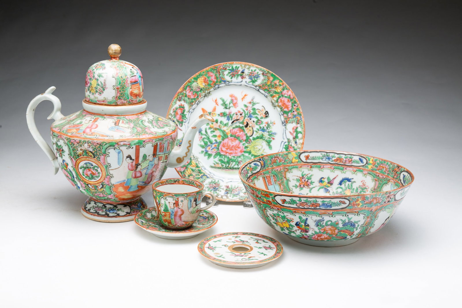 GROUP OF CHINESE ROSE MEDALLION PORCELAIN.: GROUP OF CHINESE ROSE MEDALLION PORCELAIN. Chinese, 19th Century. Six pieces, comprising a lidded teapot with unglazed foot, bowl, small plate, teacup, saucer, and pierced insert. Teapot with lid