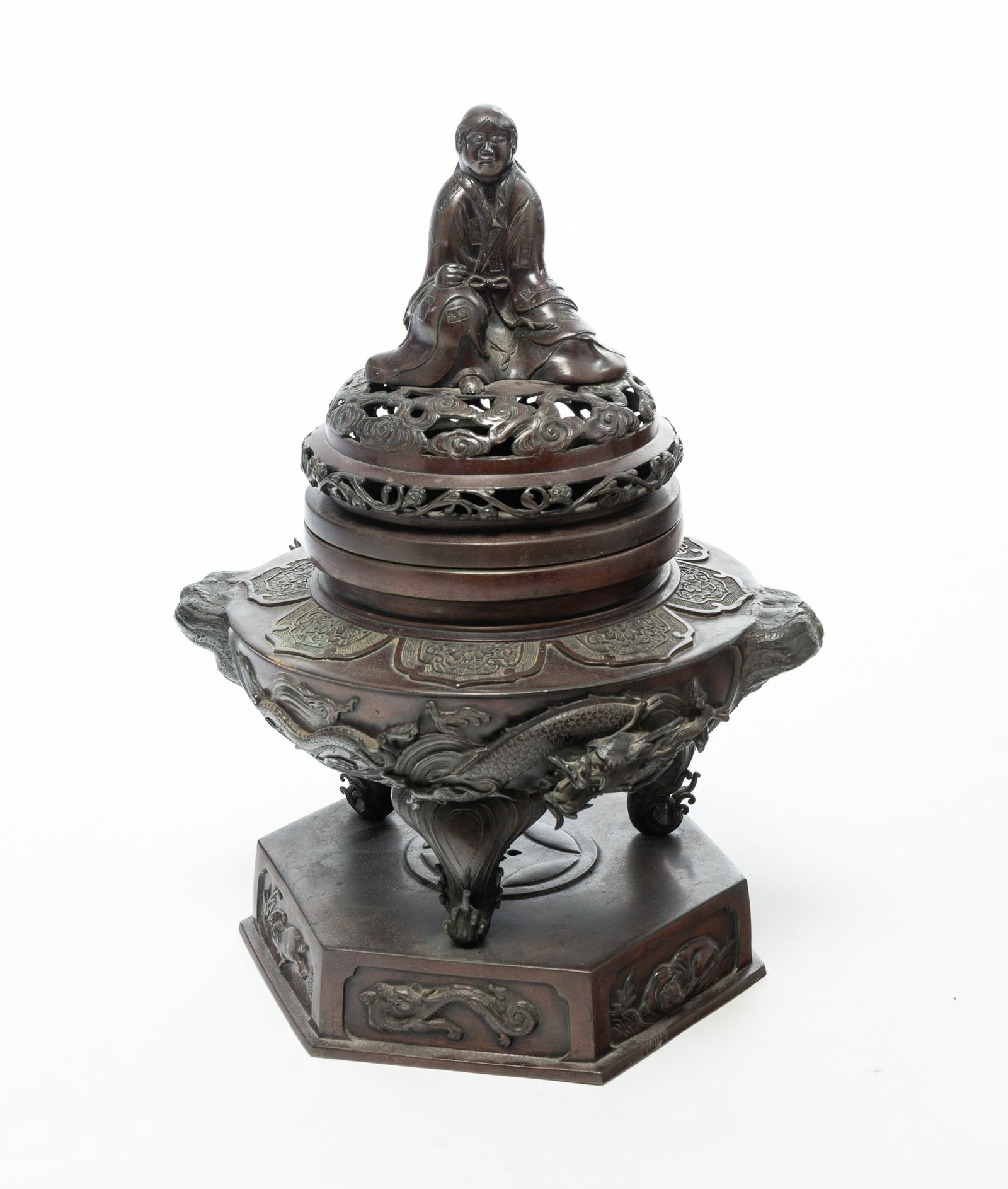 LARGE MEIJI PERIOD JAPANESE BRONZE COVERED INCENSE BURNER.: LARGE MEIJI PERIOD JAPANESE BRONZE COVERED INCENSE BURNER. Japan, late 19th or Early 20th Century. Intricately cast octagonal base with footed burner and a figural lid with fine detailed work. 21"h.