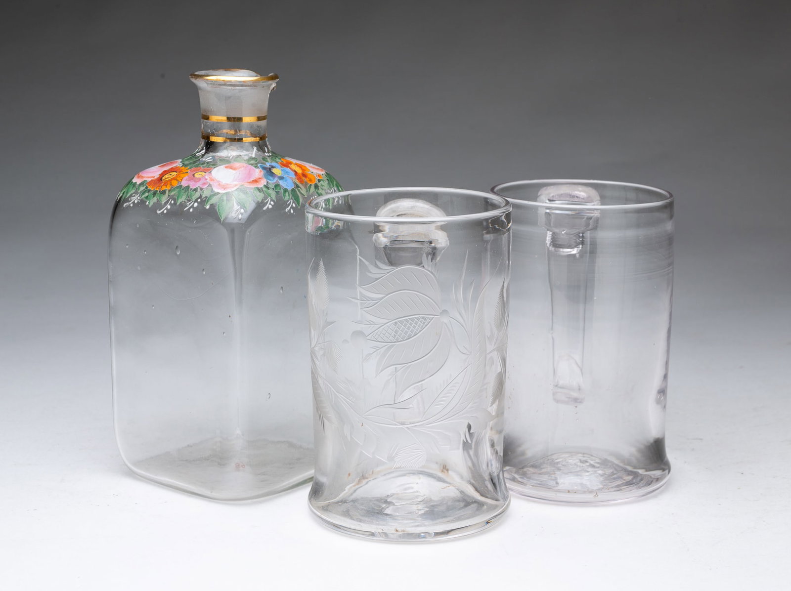 TWO BLOWN GLASS MUGS AND A PAINTED GLASS DECANTER. (1 of 5)