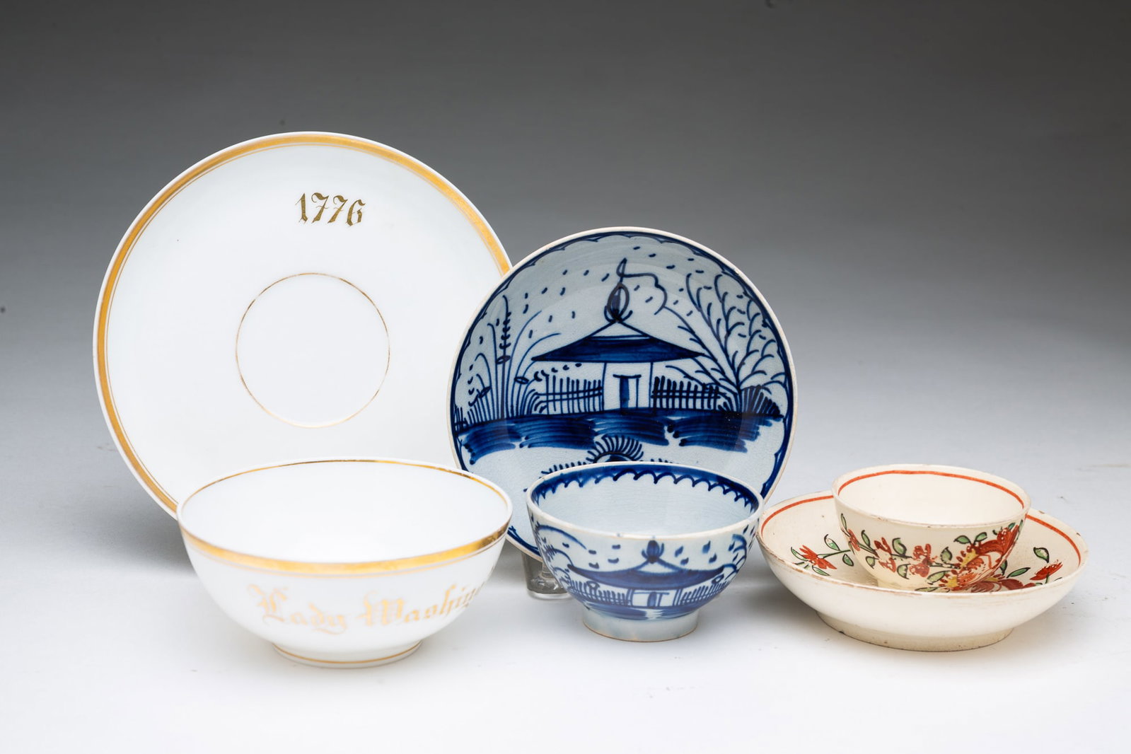 TWO SETS OF ENGLISH TEABOWLS AND SAUCERS AND A FRENCH CHARLES PILLIVUYT & CO. LADY WASHINGTON CUP: TWO SETS OF ENGLISH TEABOWLS AND SAUCERS AND A FRENCH CHARLES PILLIVUYT & CO. LADY WASHINGTON CUP AND SAUCER. 18th Century. Includes a pearlware bowl and saucer in a blue and white chinoiserie