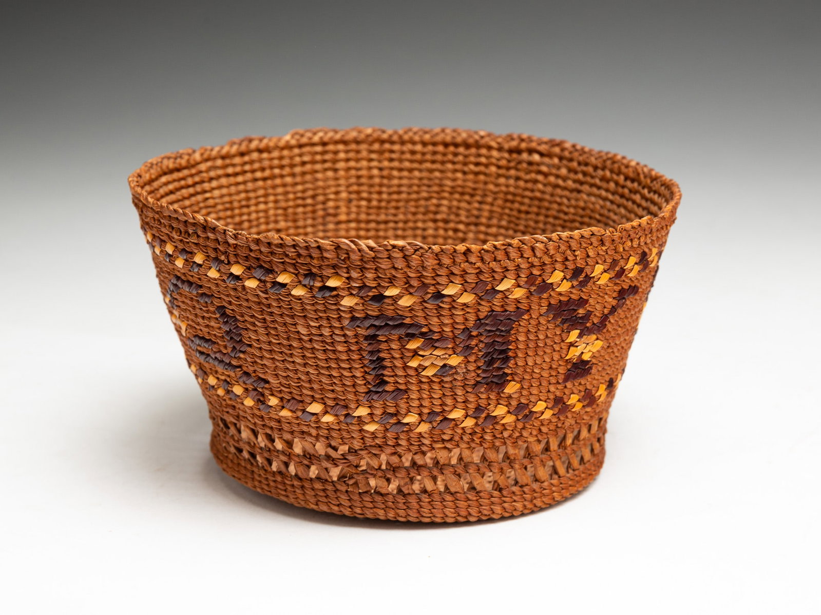 NORTHWEST COAST TSIMSHIAN OPEN BASKET.: NORTHWEST COAST TSIMSHIAN OPEN BASKET. American, Late 19th or early 20th Century. Tightly woven with "My Darlinq" around center. Reticulated bands near bottom. 3"h.